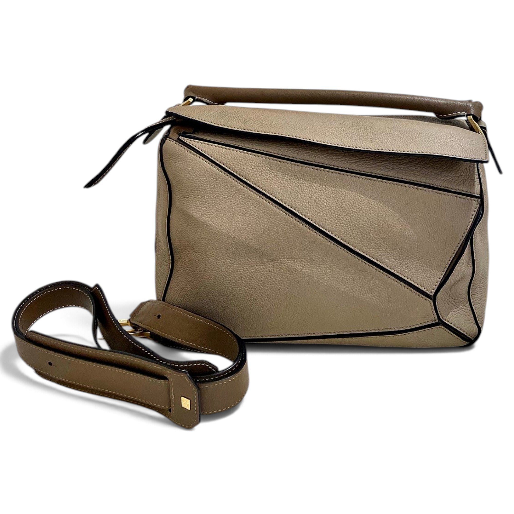 Puzzle leather handbag