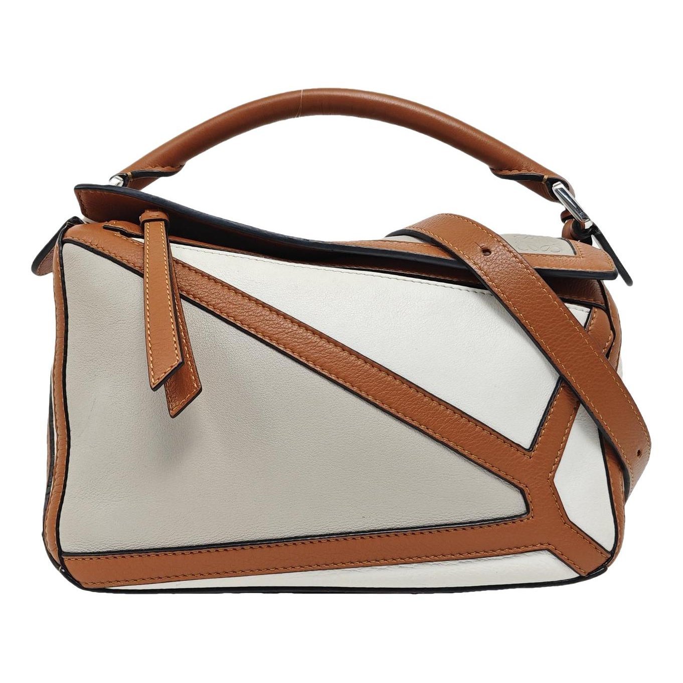 Puzzle leather handbag