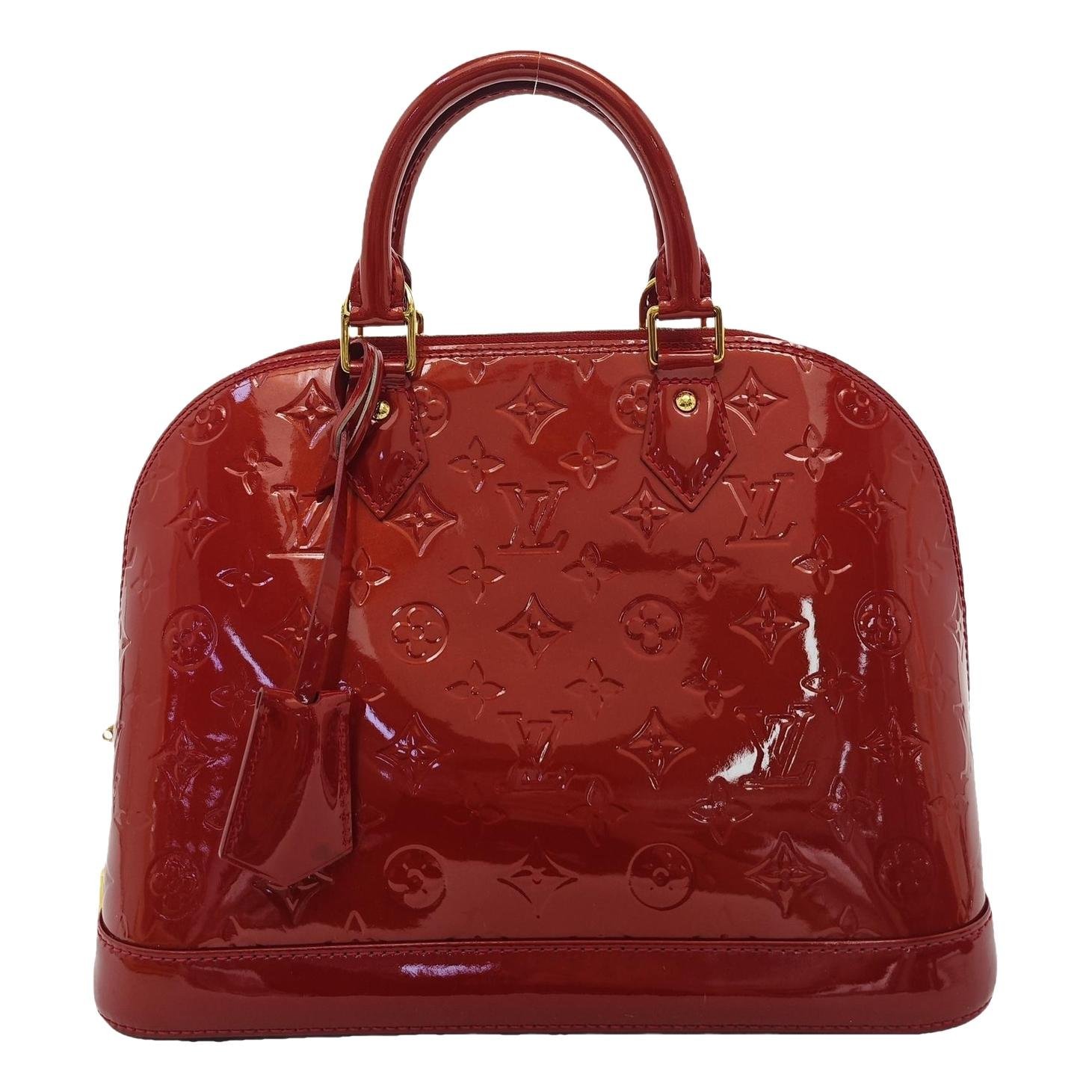 Alma patent leather handbag