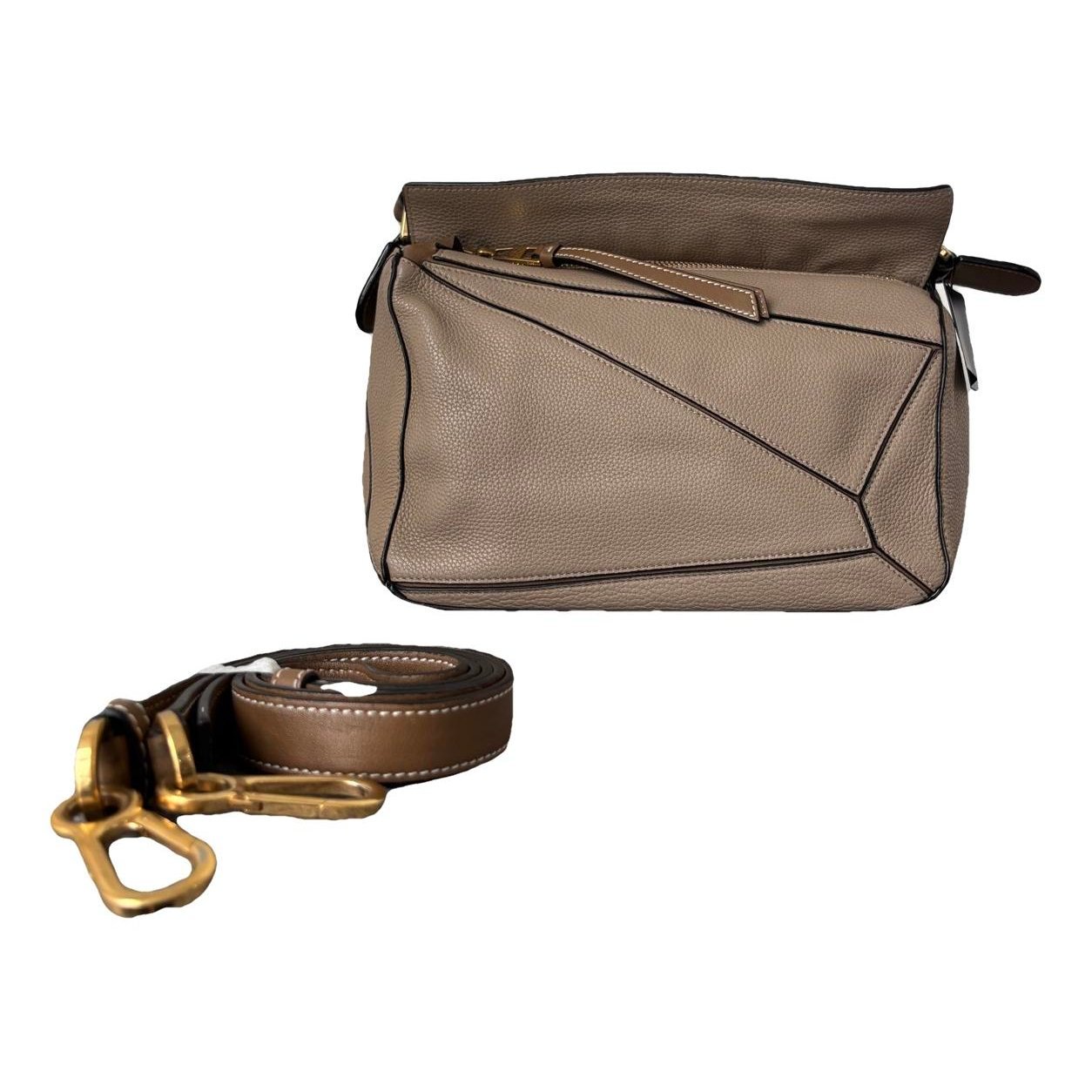 Puzzle leather handbag