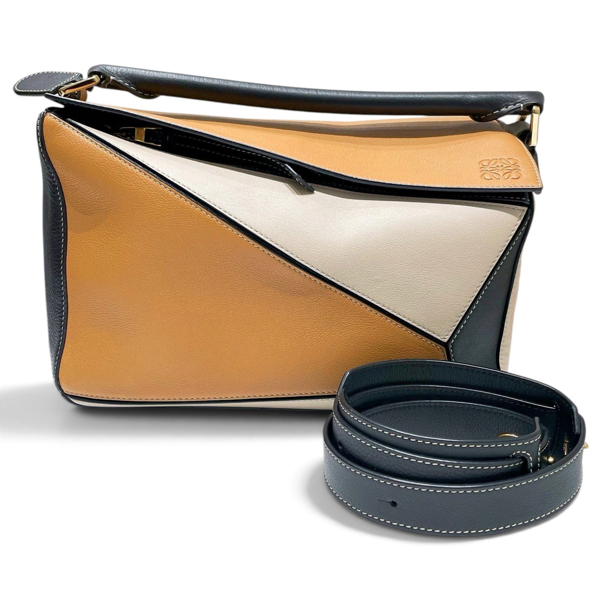 Puzzle leather handbag