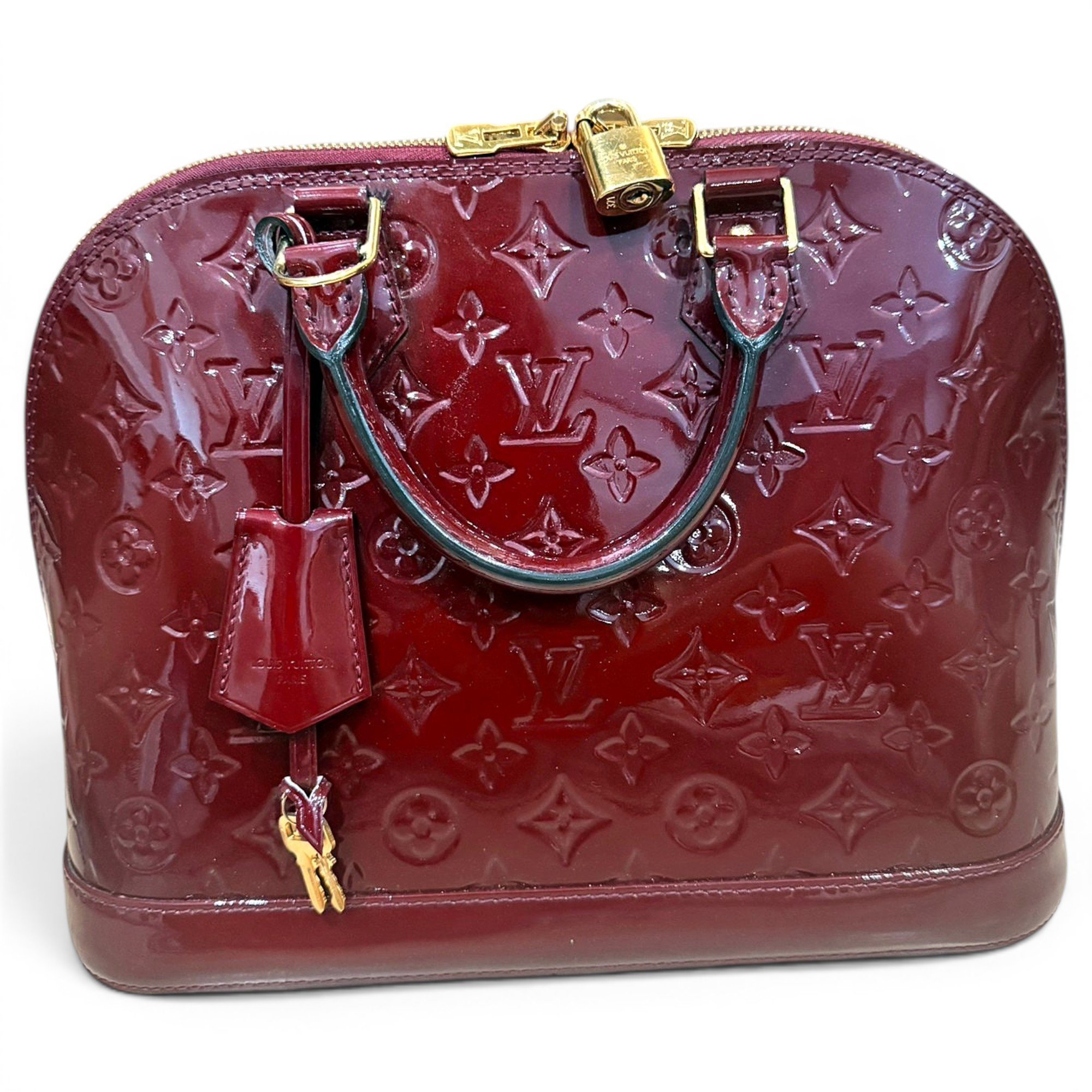 Alma patent leather handbag