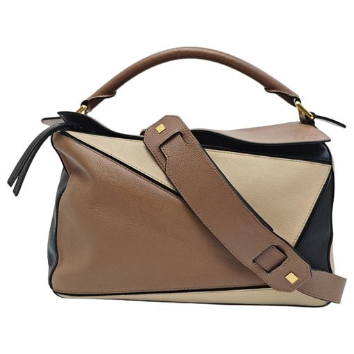 Puzzle leather handbag