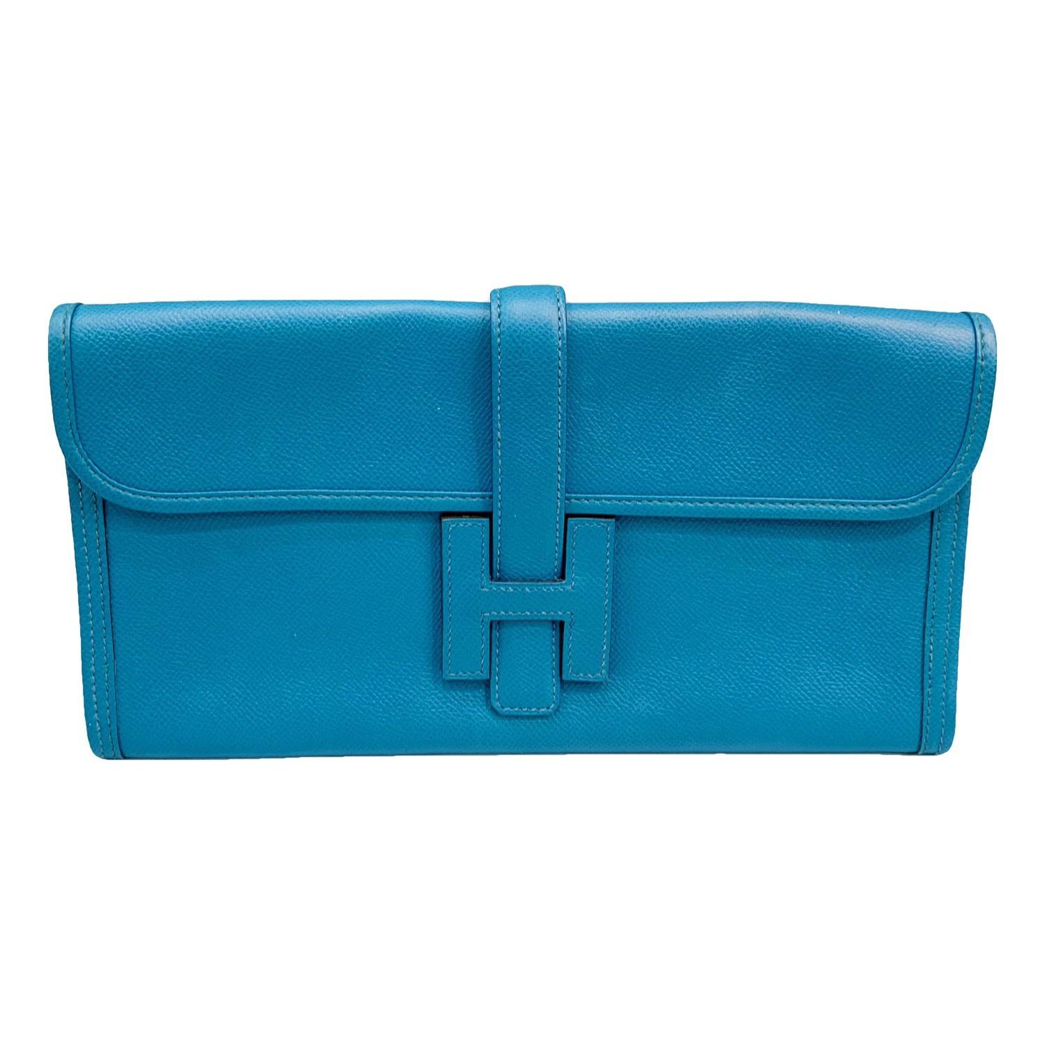 Jige leather clutch bag