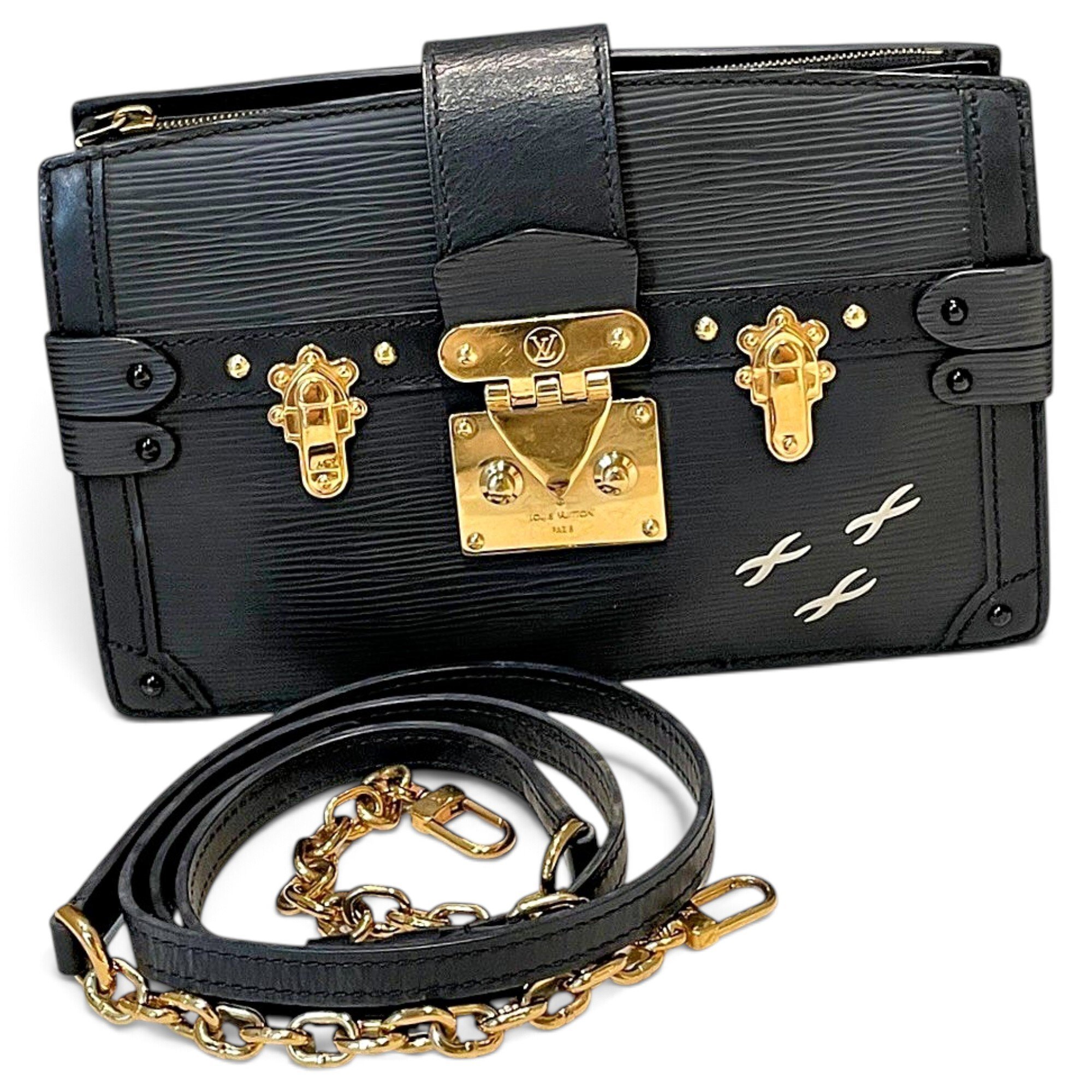 Pochette Trunk leather handbag