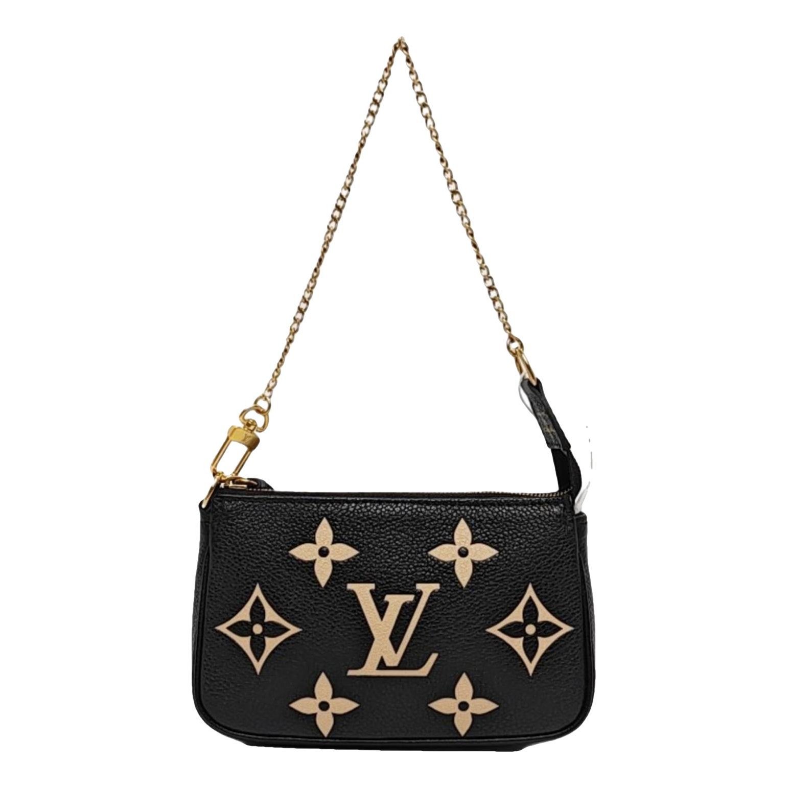 Maxi Multi Pochette Accessoires leather handbag