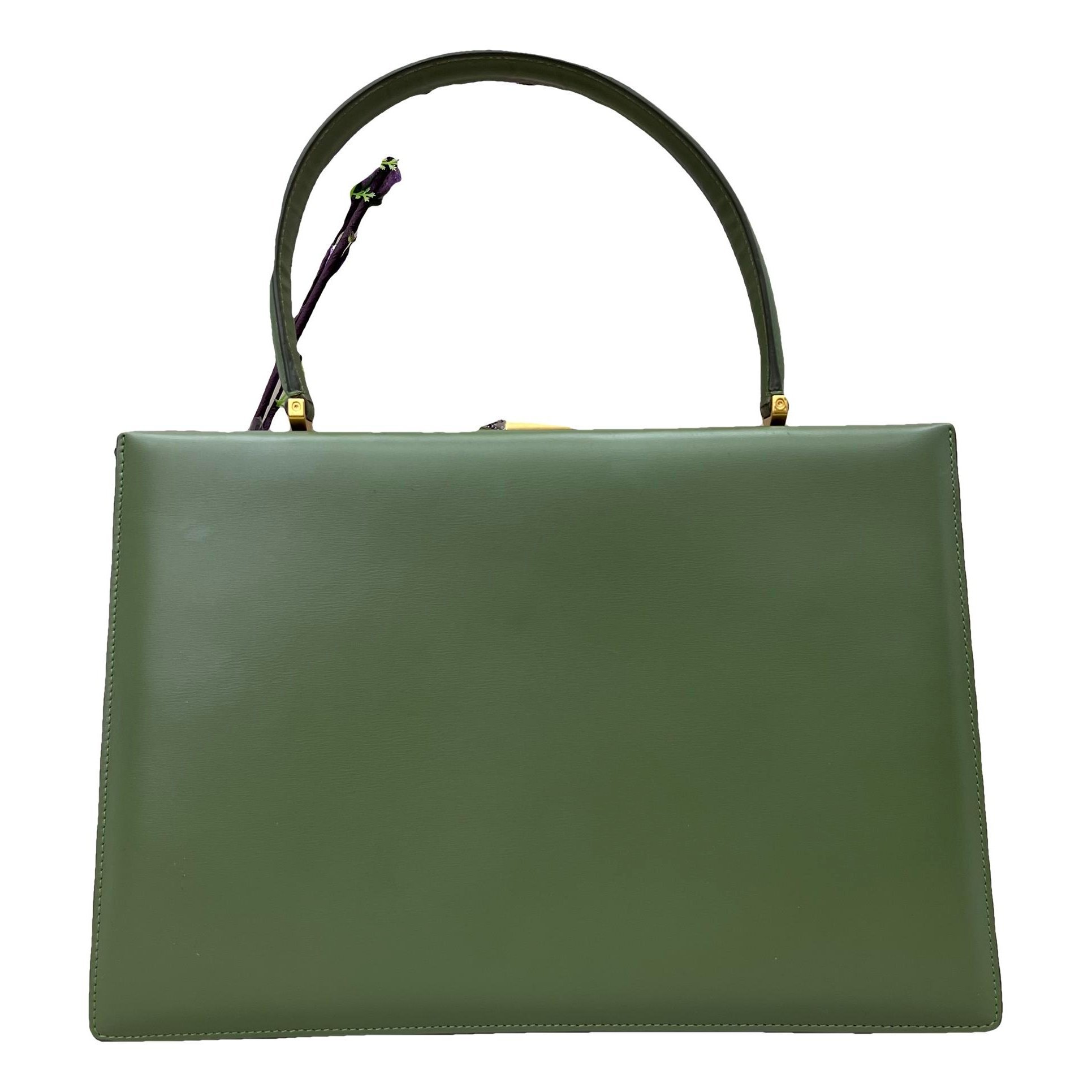 Clasp leather handbag