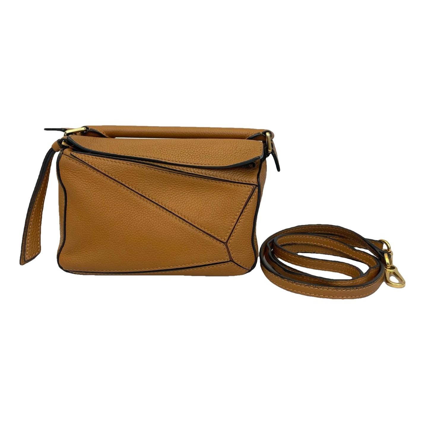 Puzzle leather handbag