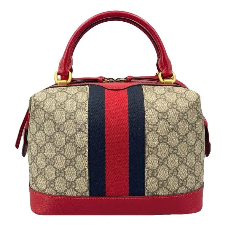 Ophidia Top Handle leather handbag