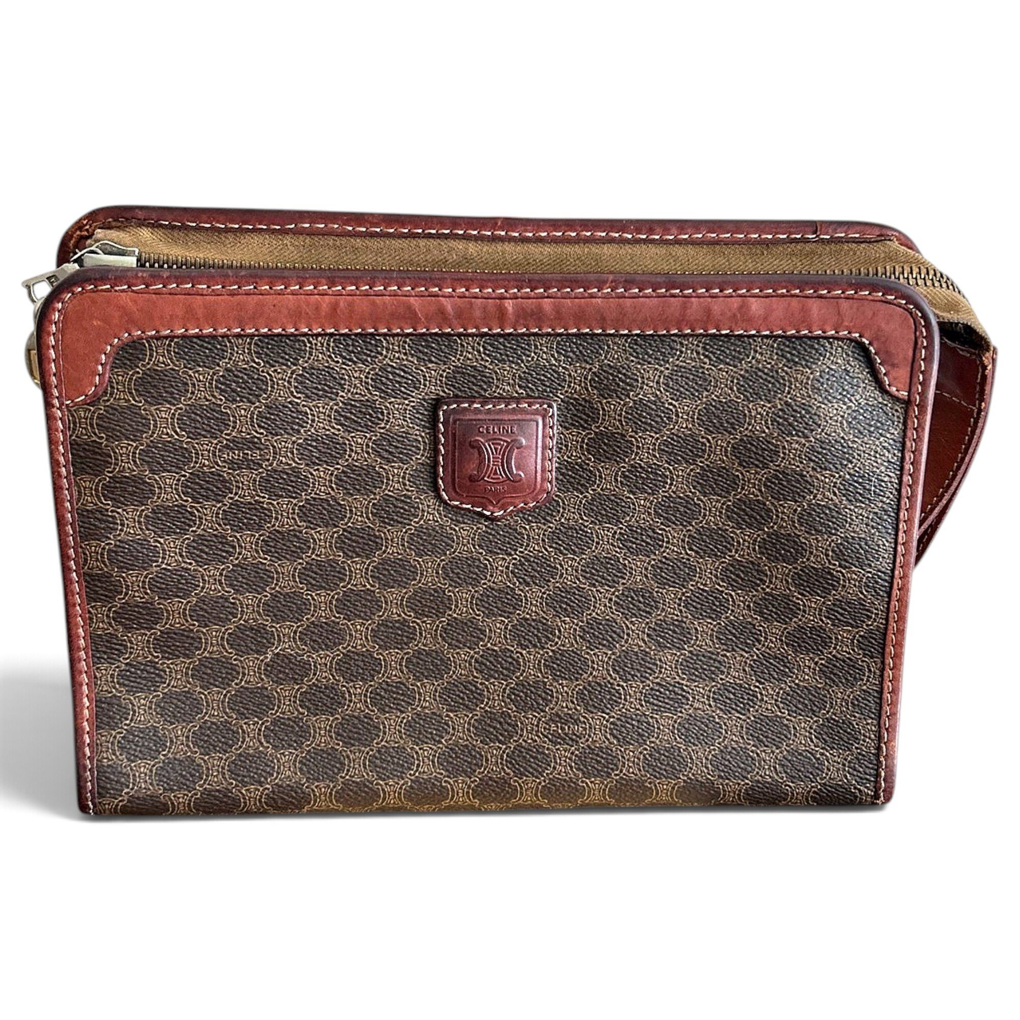 Triomphe Vintage leather clutch bag