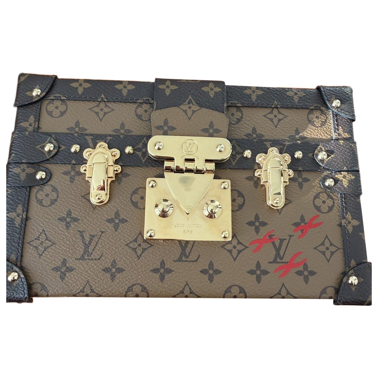 Petite Malle leather clutch bag