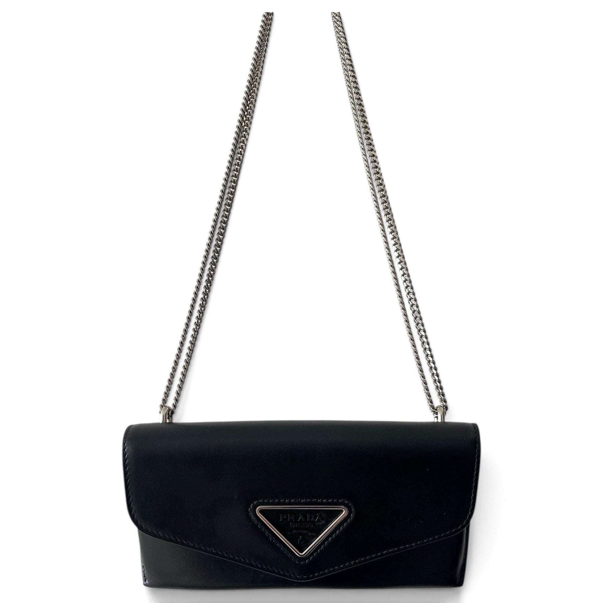 Triangle leather clutch bag