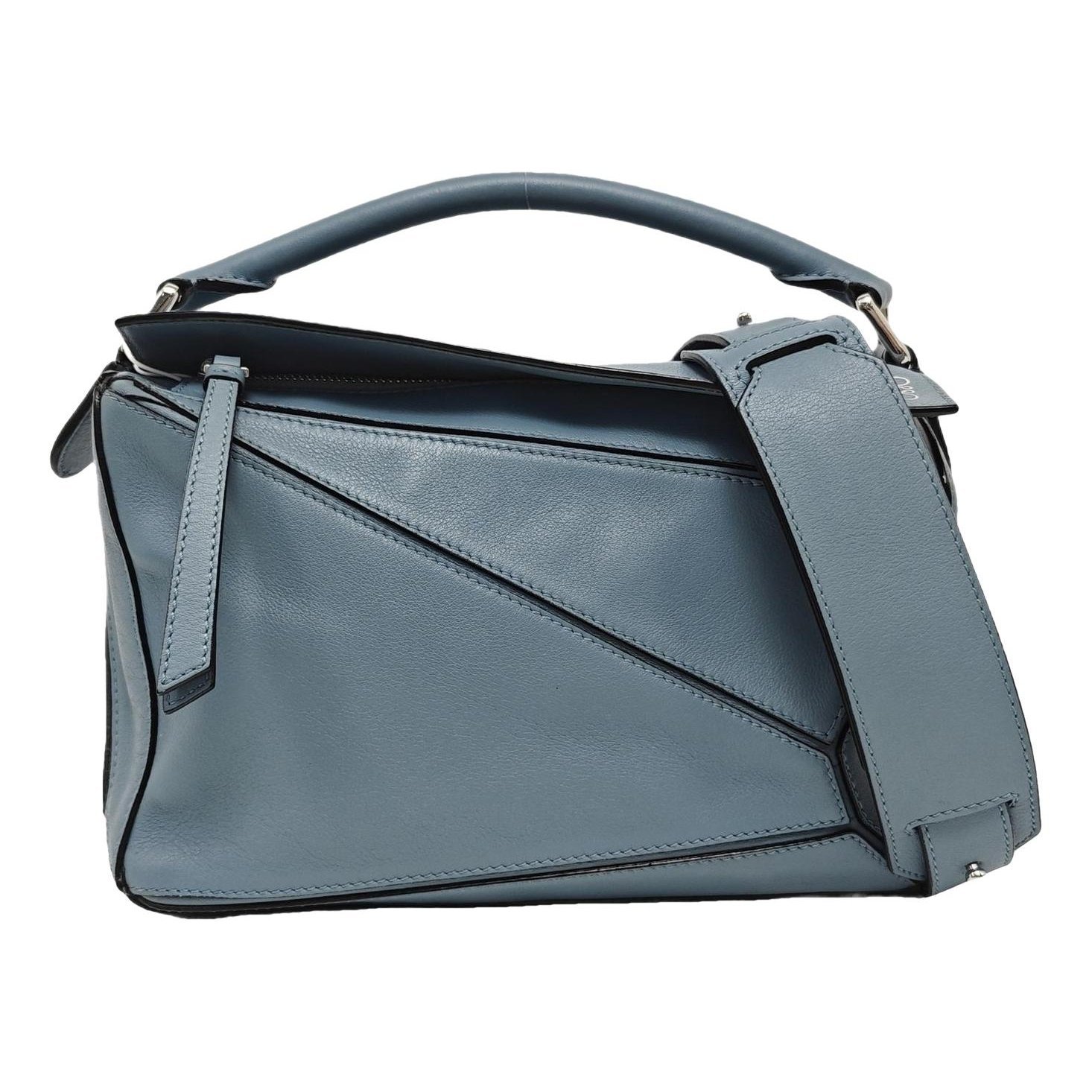 Puzzle leather handbag