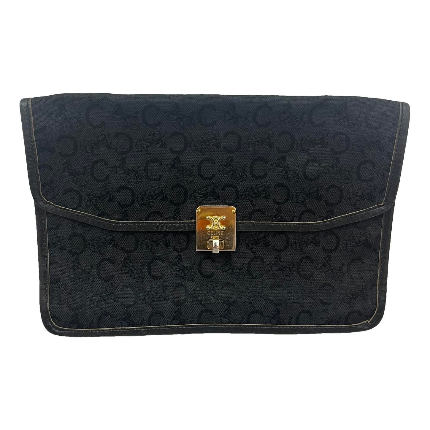 Triomphe Vintage cloth clutch bag