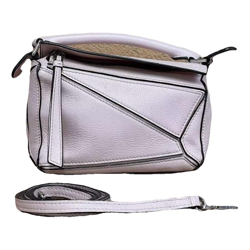 Puzzle leather handbag