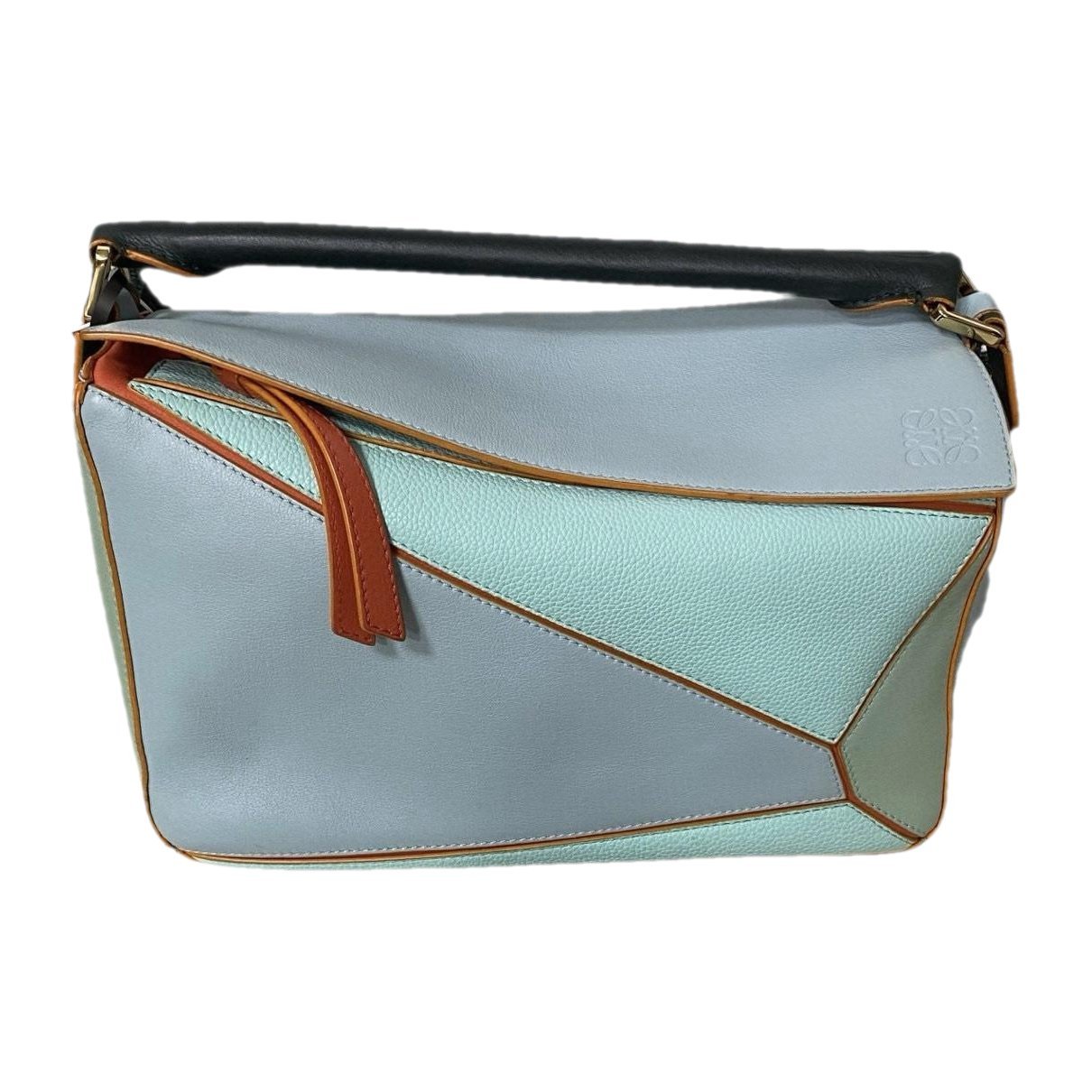 Puzzle leather handbag