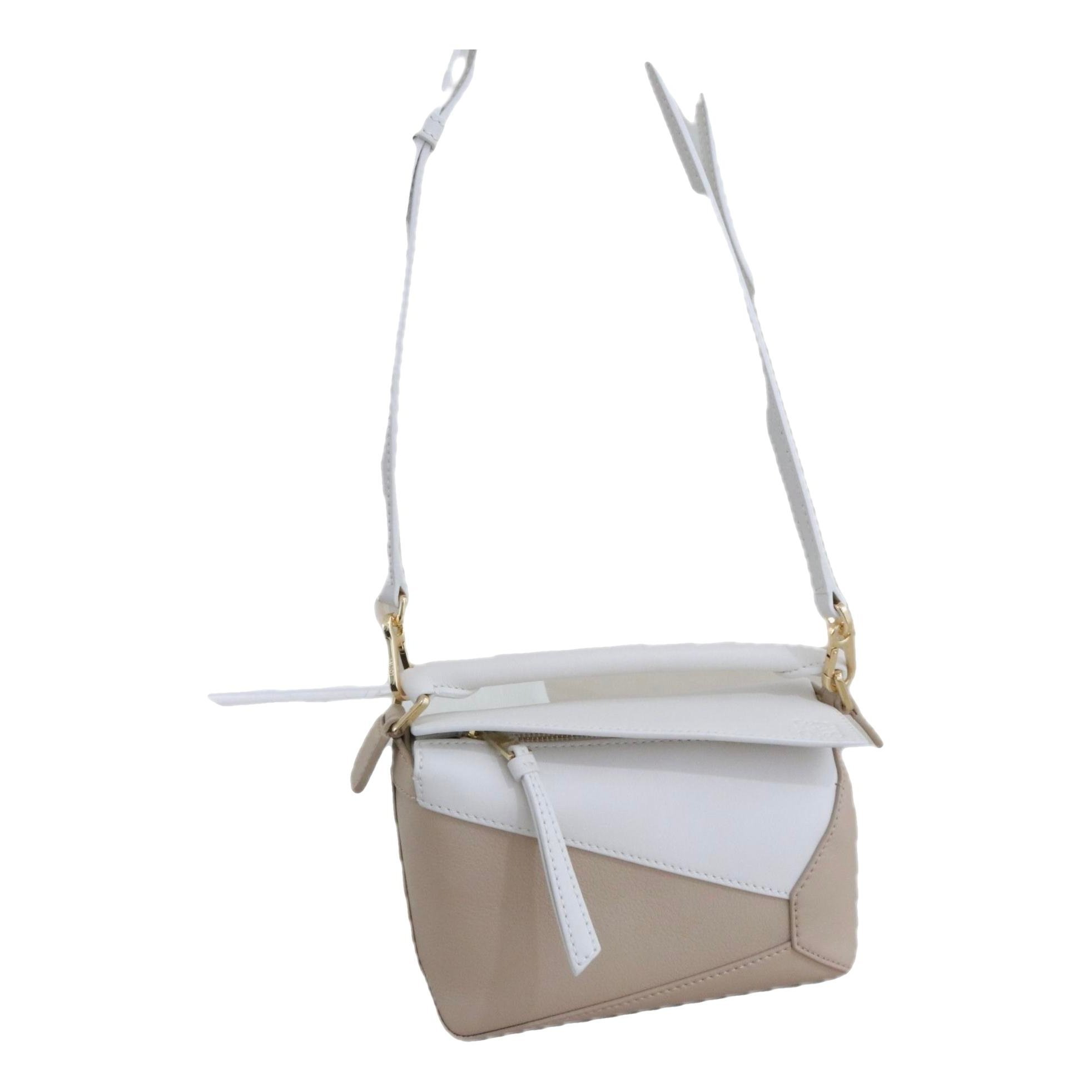 Puzzle leather handbag