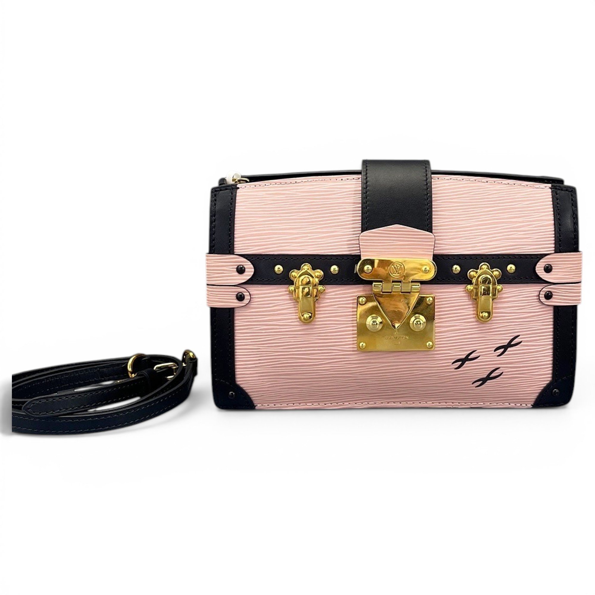 Pochette Trunk leather handbag