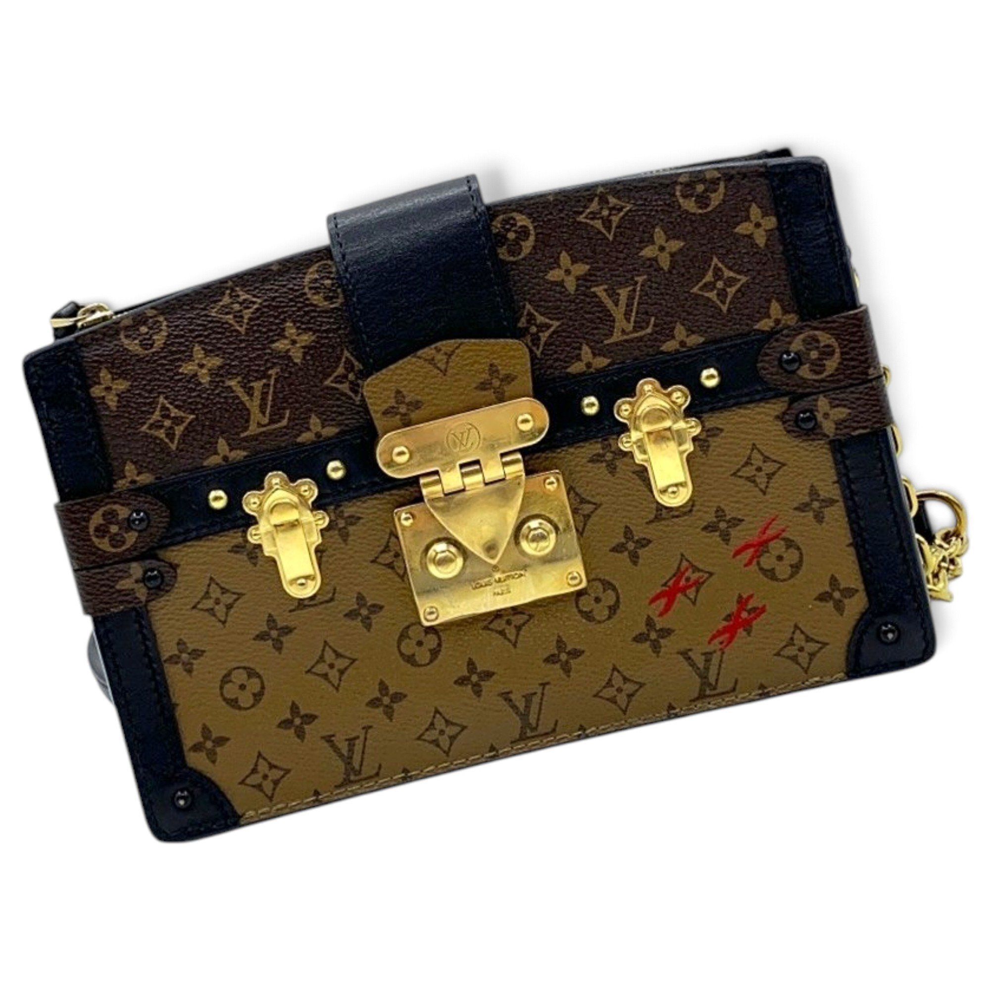 Pochette Trunk leather handbag