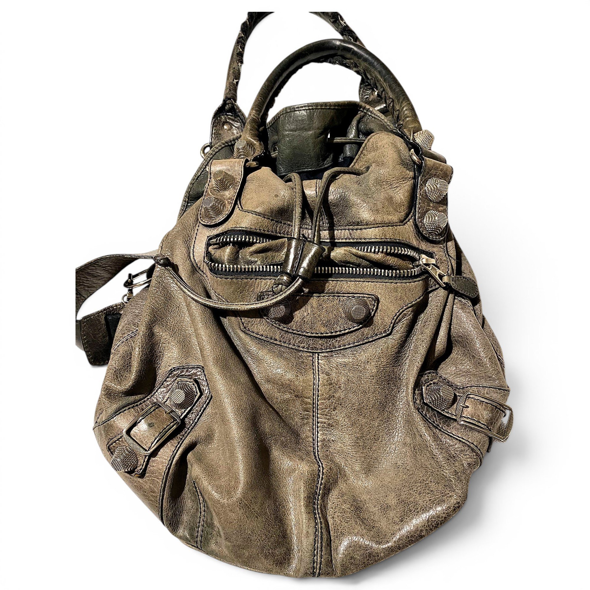 Pompon leather handbag