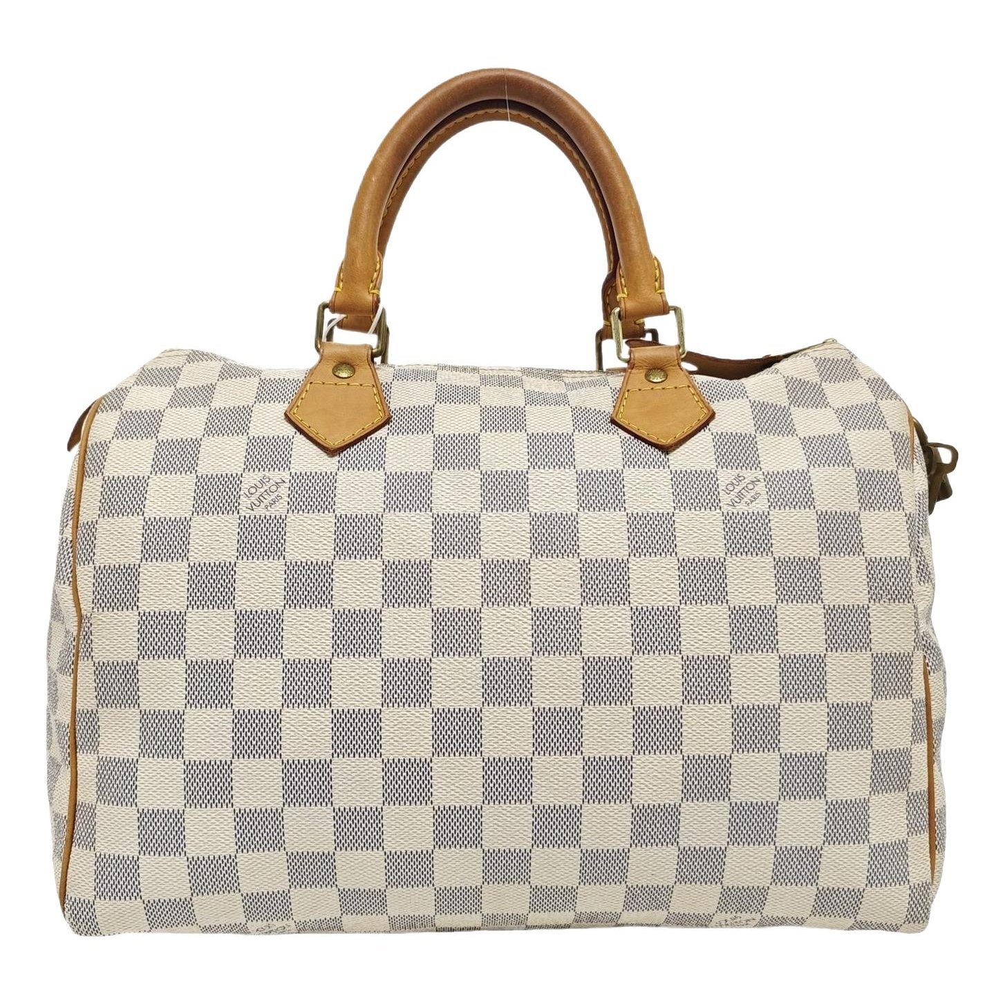 Nano Speedy / Mini HL leather handbag