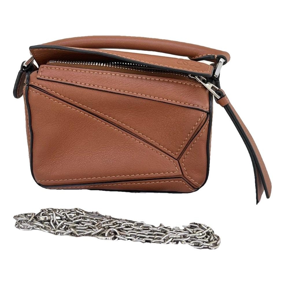Puzzle leather handbag