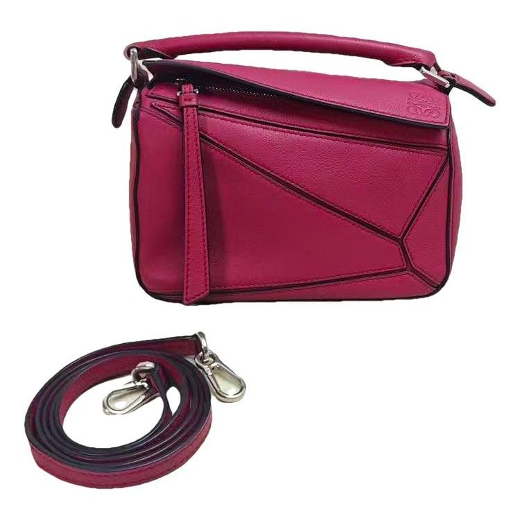Puzzle leather handbag