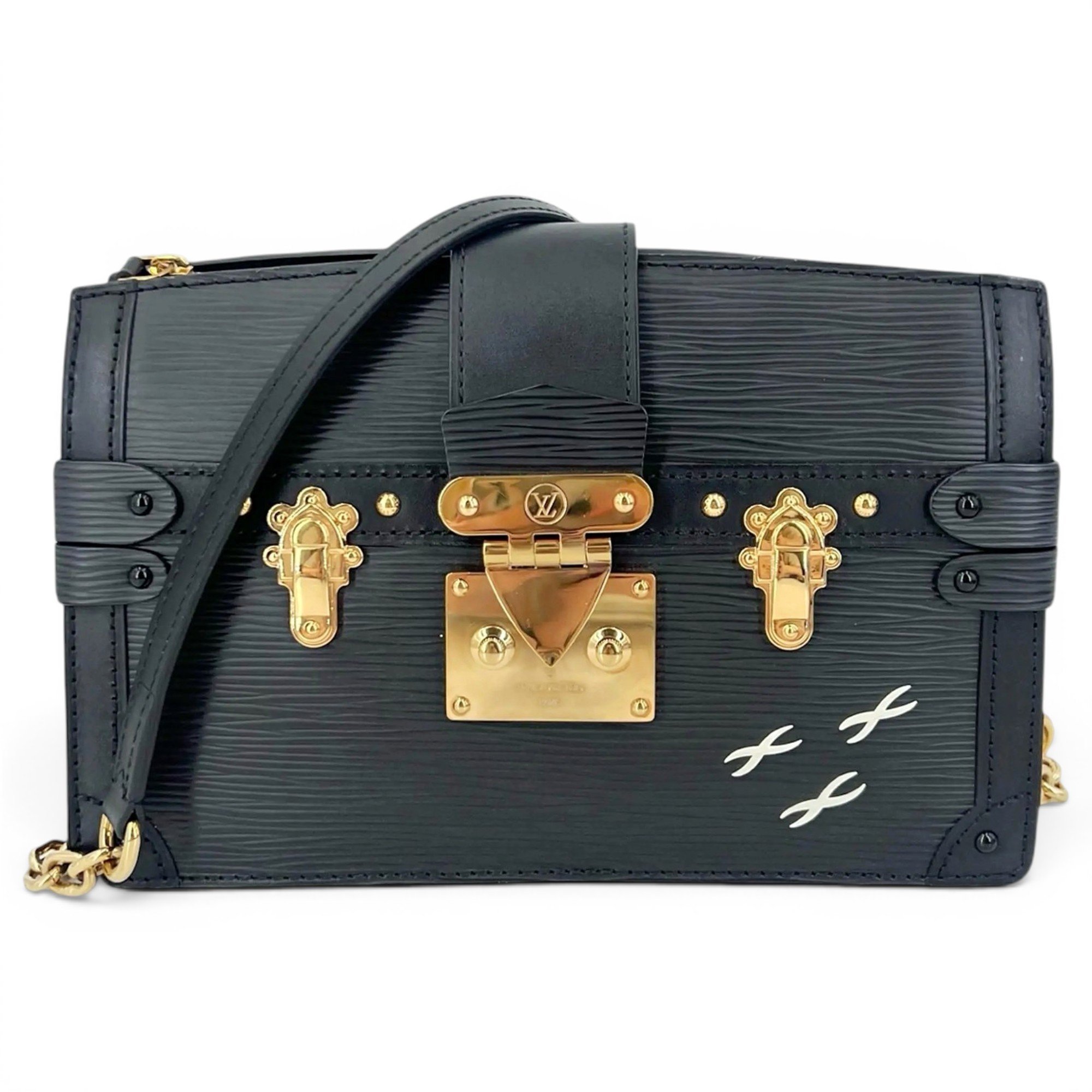Pochette Trunk leather handbag