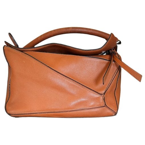 Puzzle leather handbag