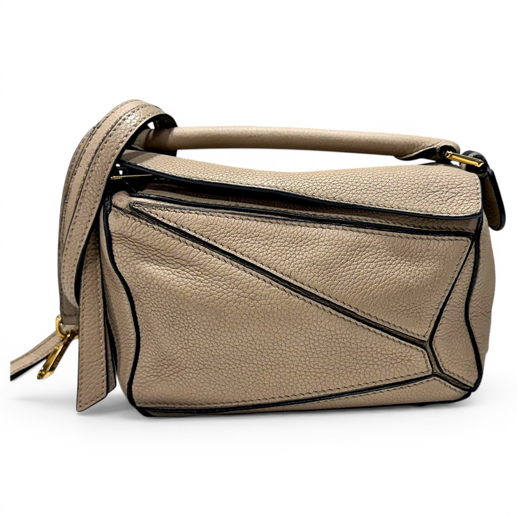 Puzzle leather handbag
