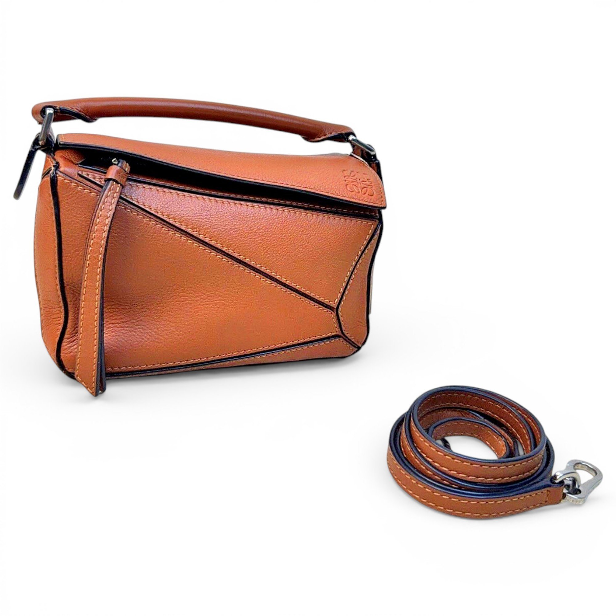 Puzzle leather handbag