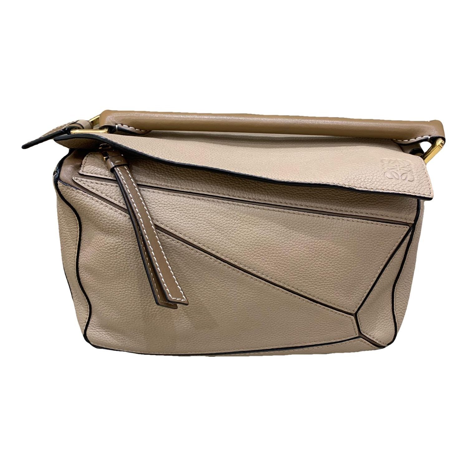 Puzzle leather handbag