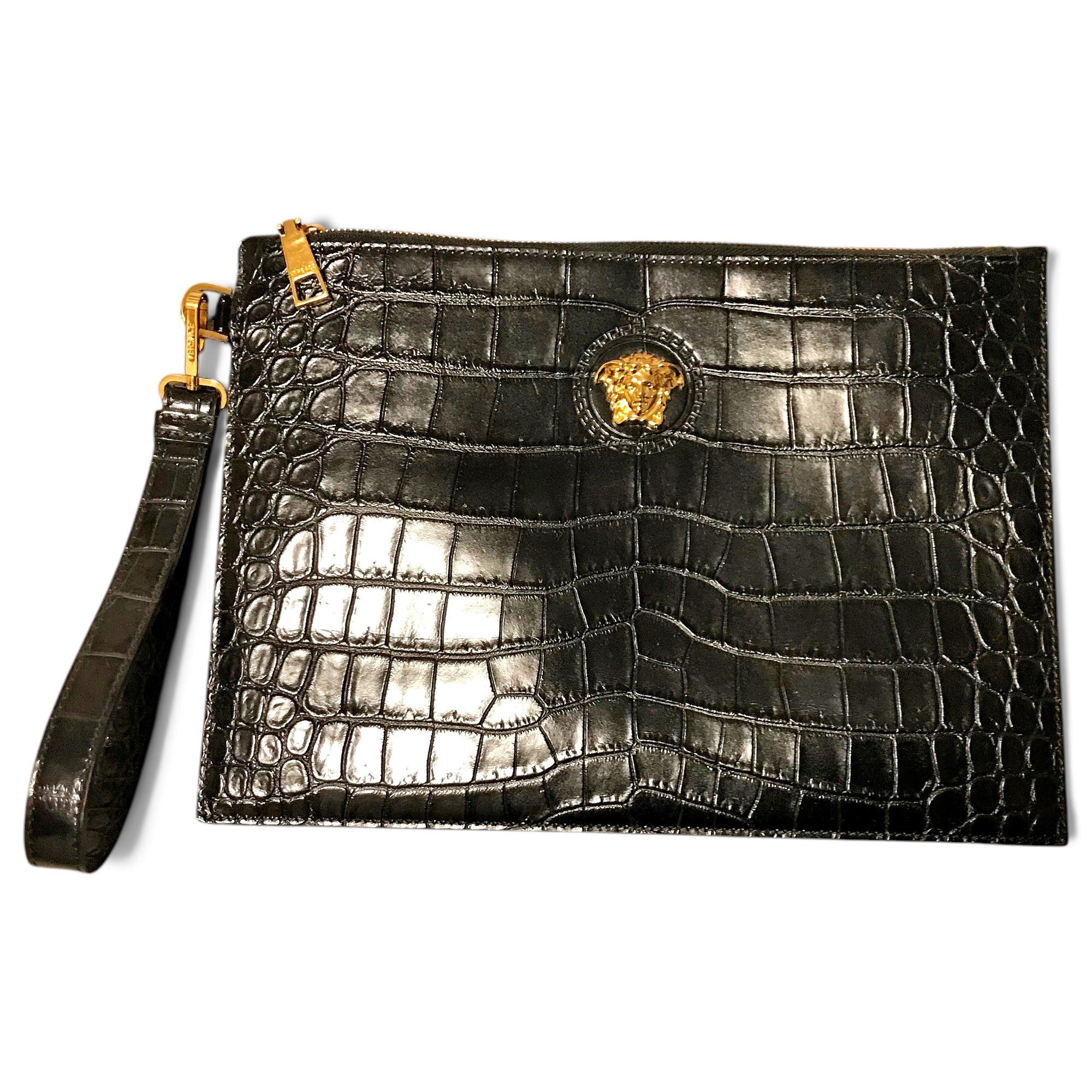 La Medusa leather clutch bag