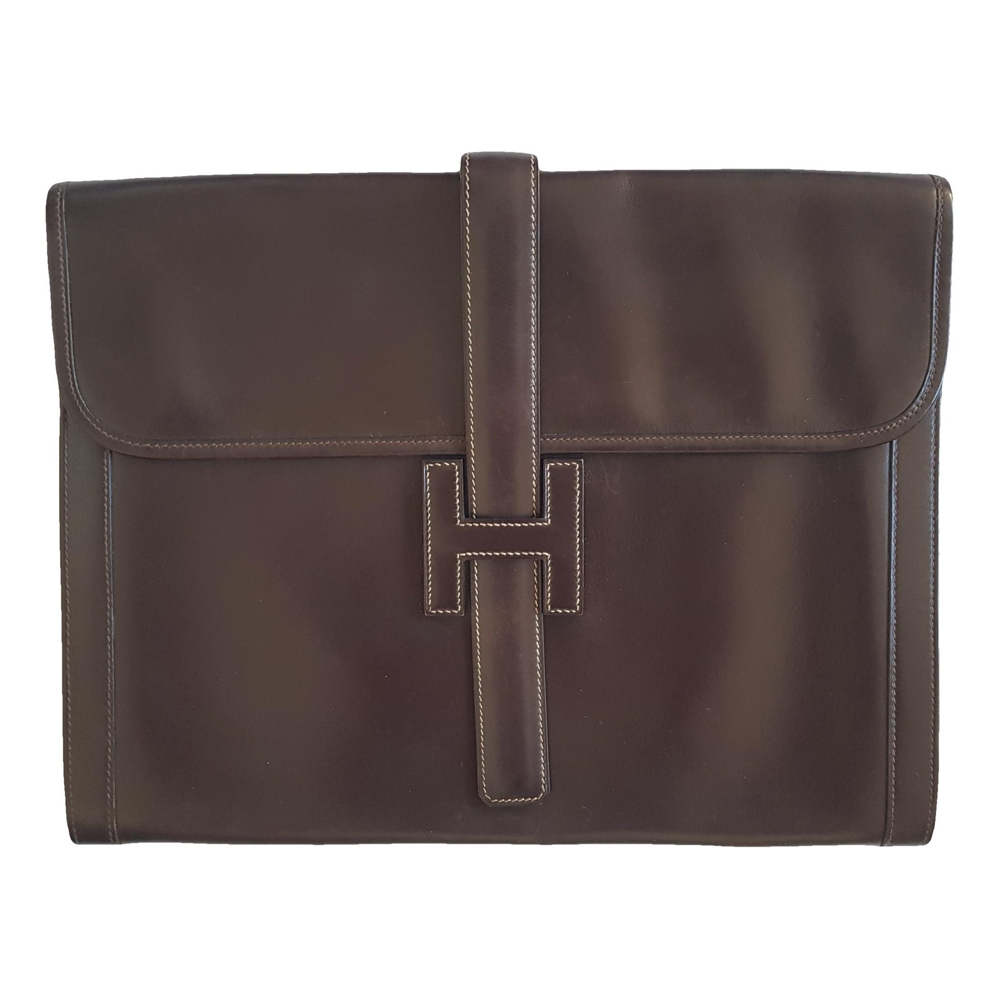 Jige leather clutch bag