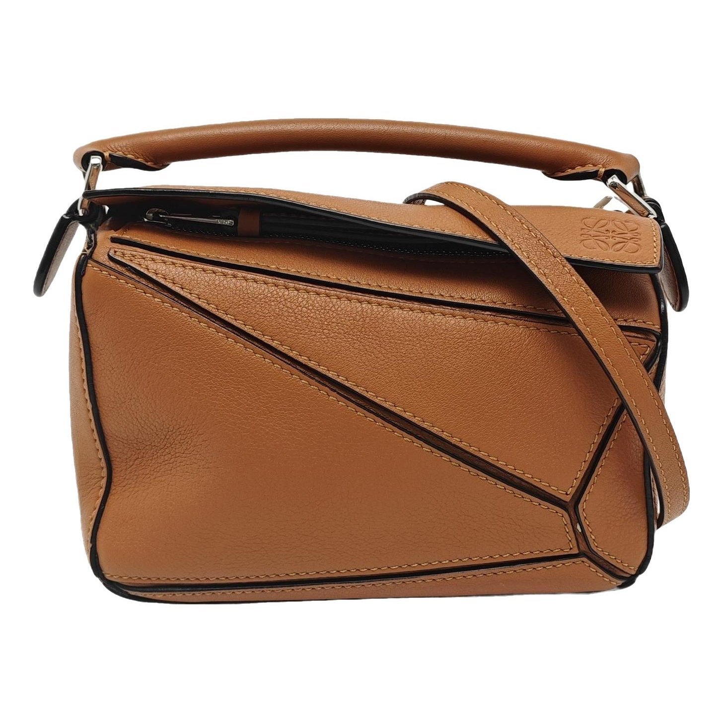 Puzzle leather handbag