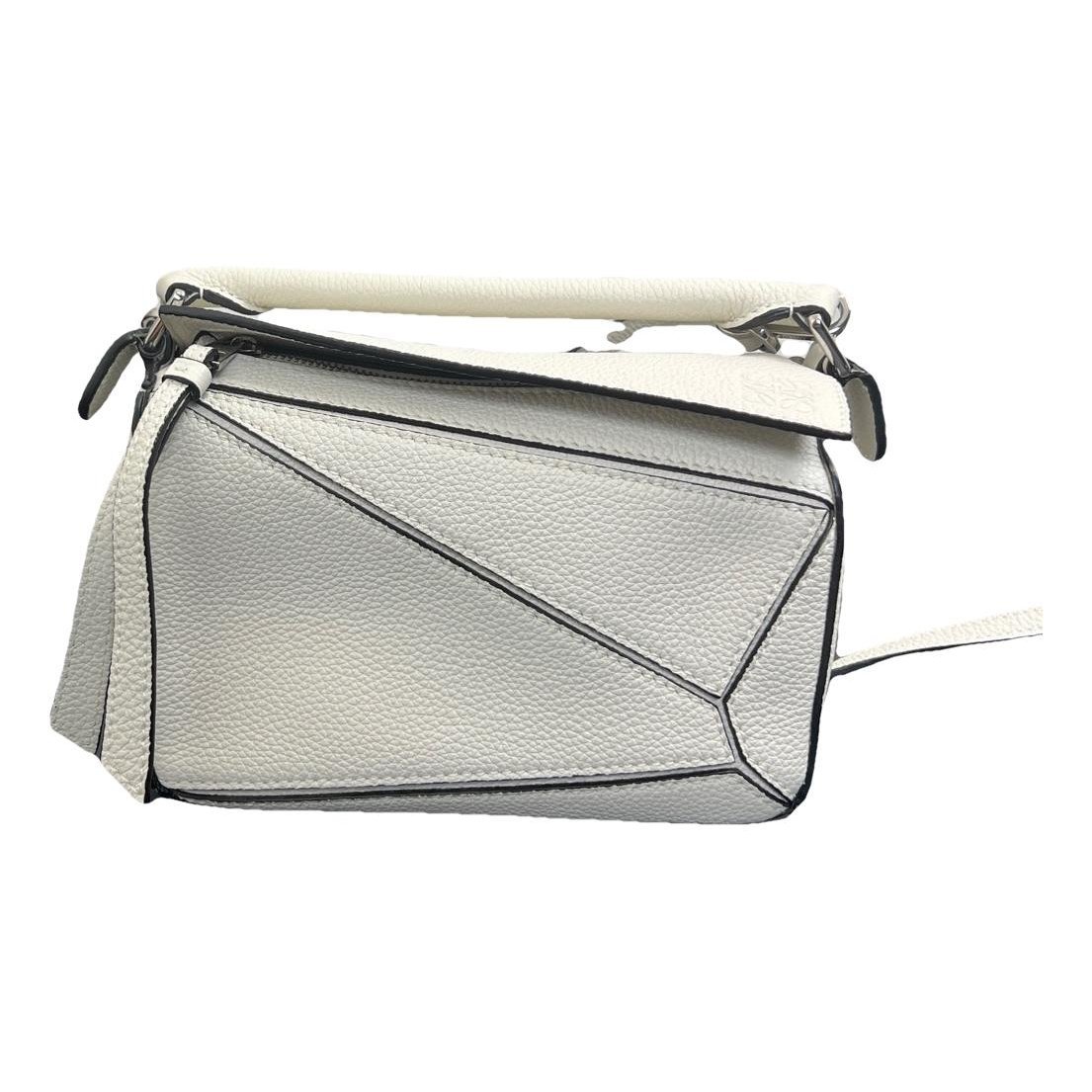 Puzzle leather handbag