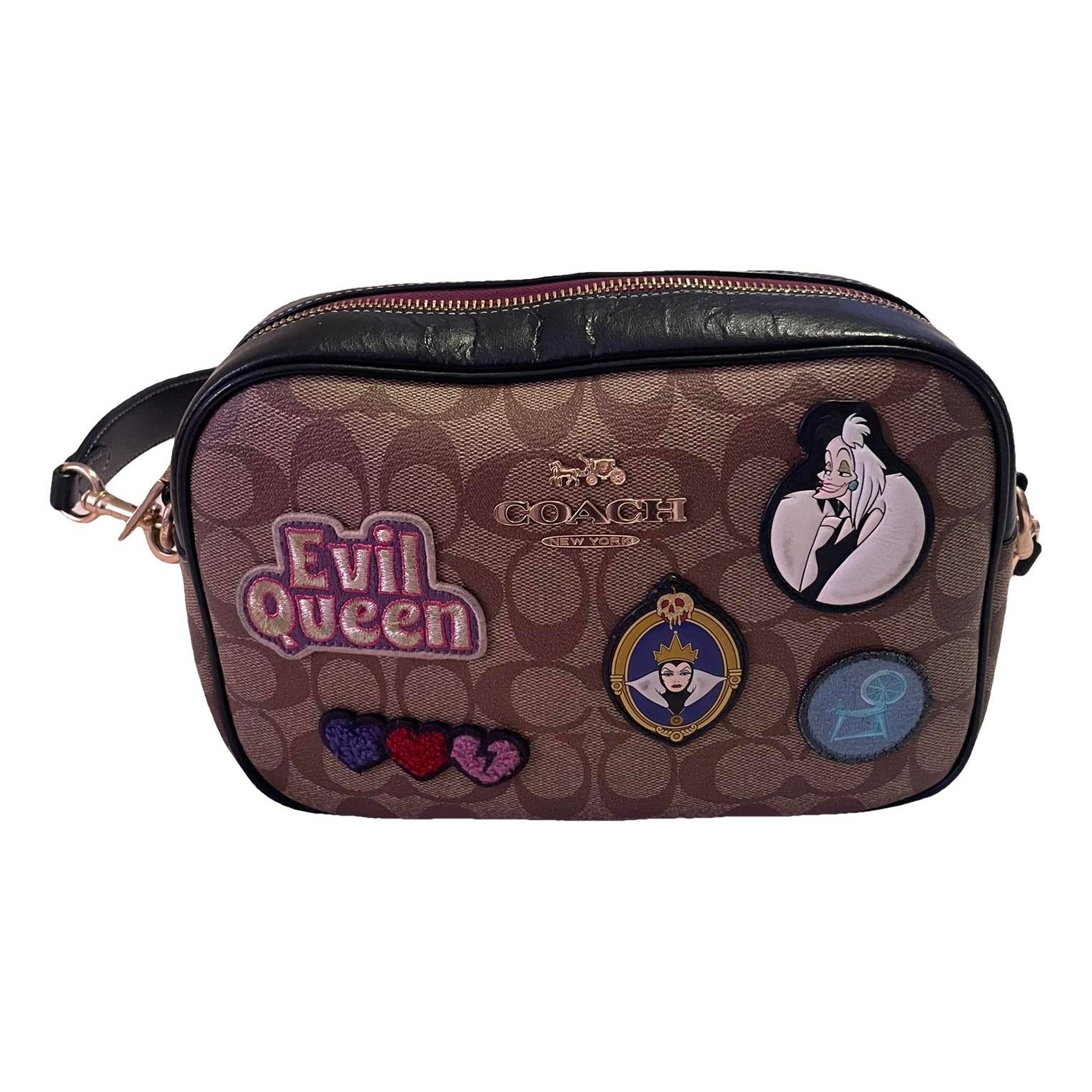 Canvas Courier Crossbody patent leather crossbody bag