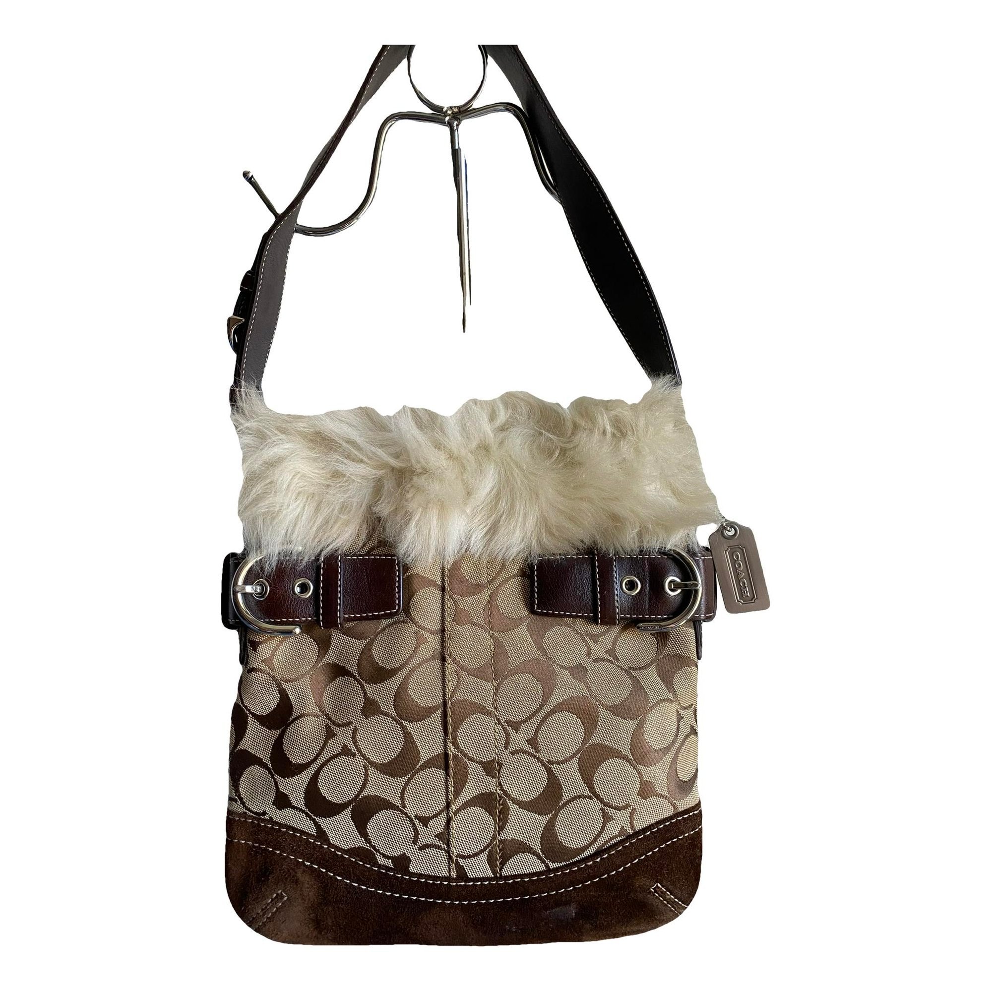 Signature Sufflette cloth handbag