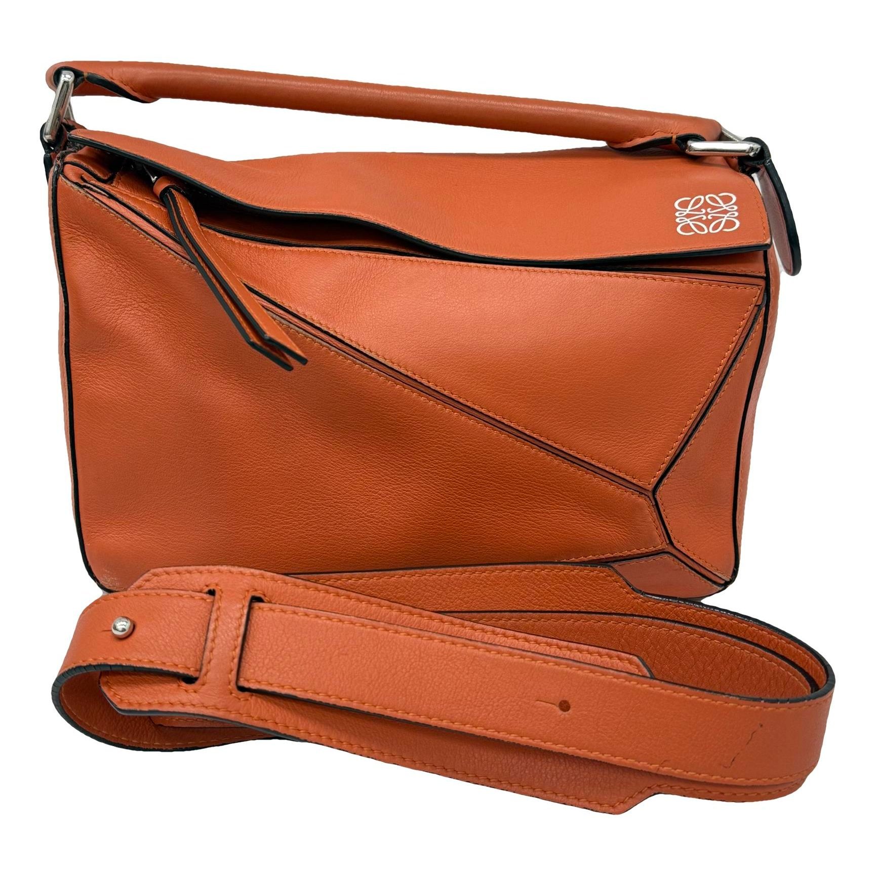 Puzzle leather handbag