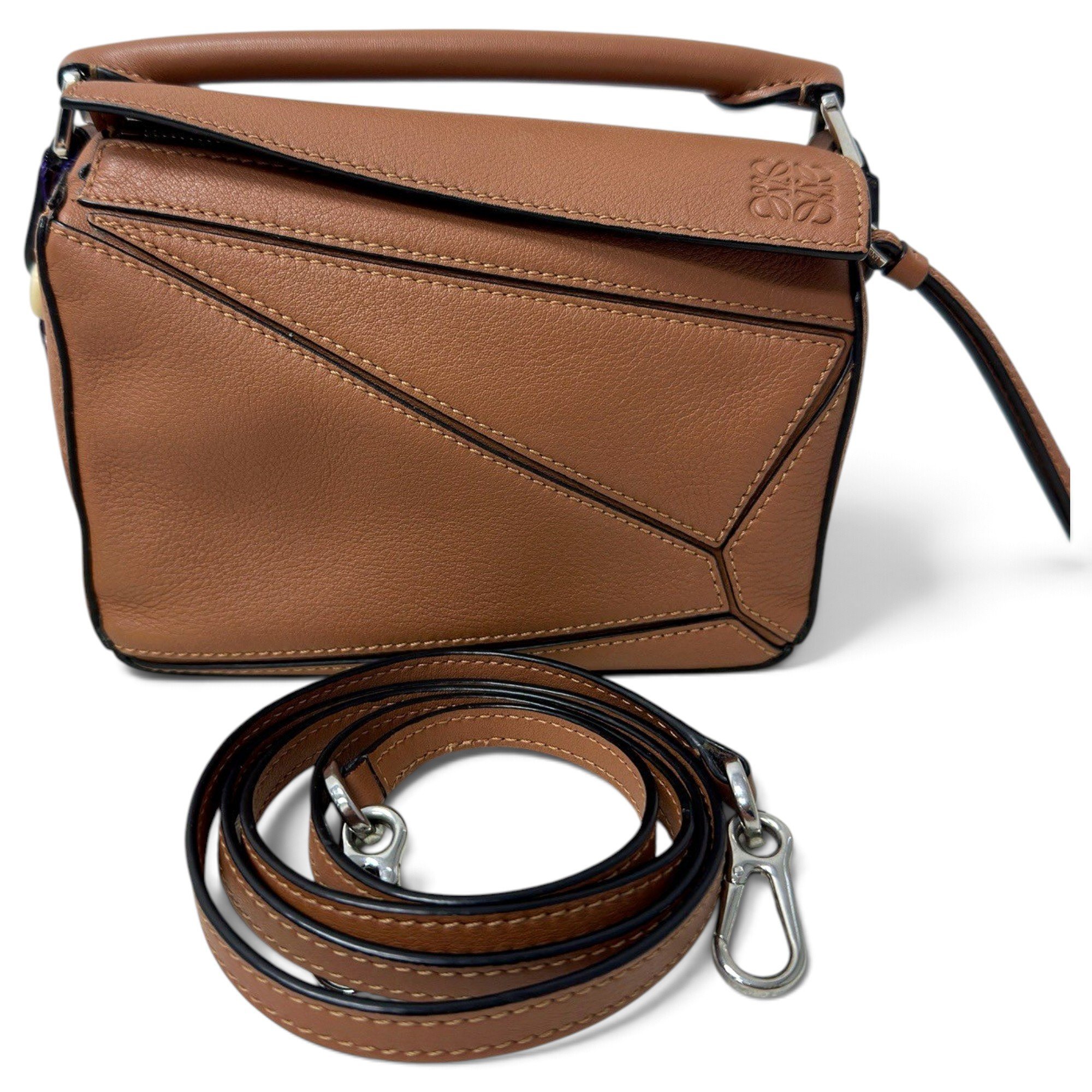 Puzzle leather handbag