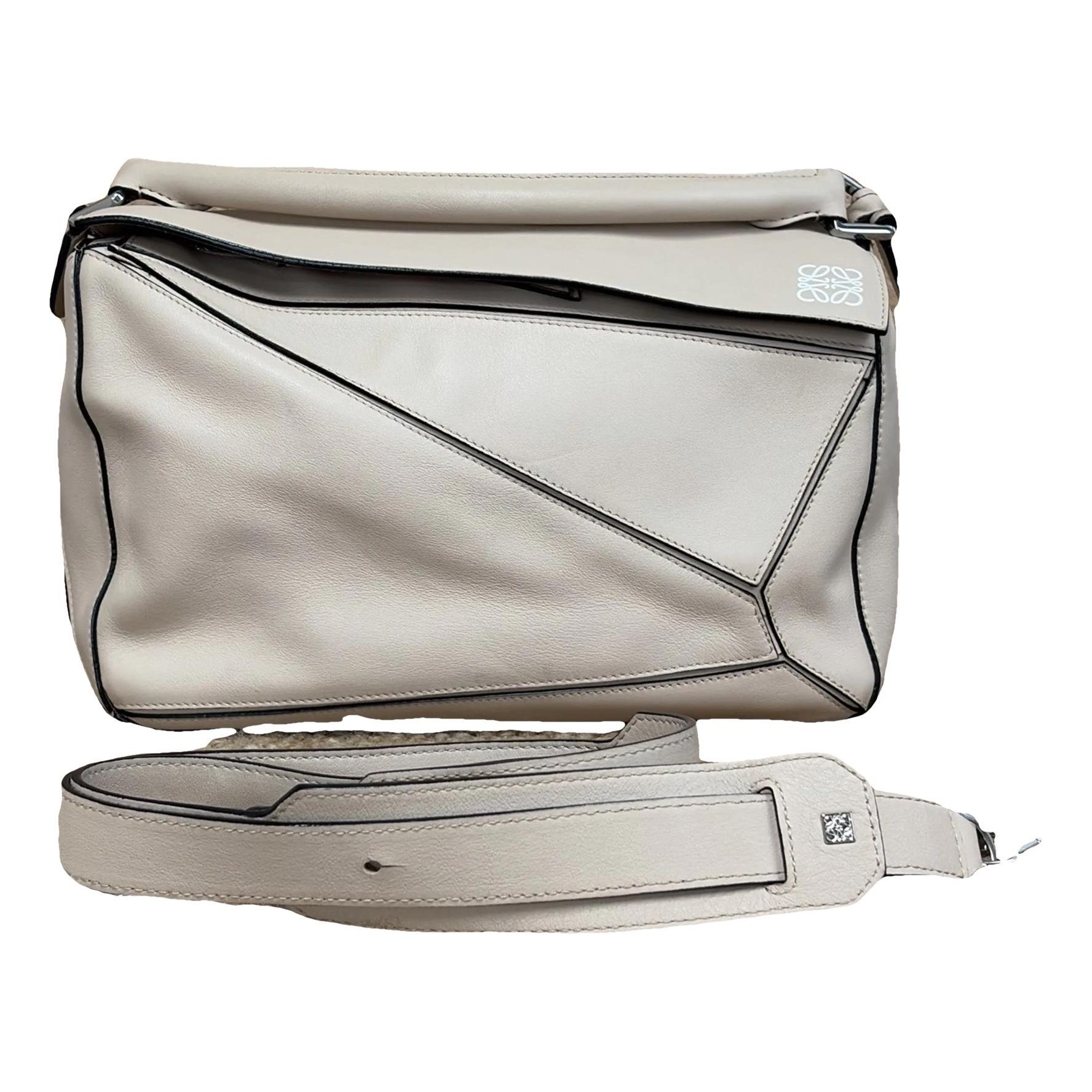 Puzzle leather handbag