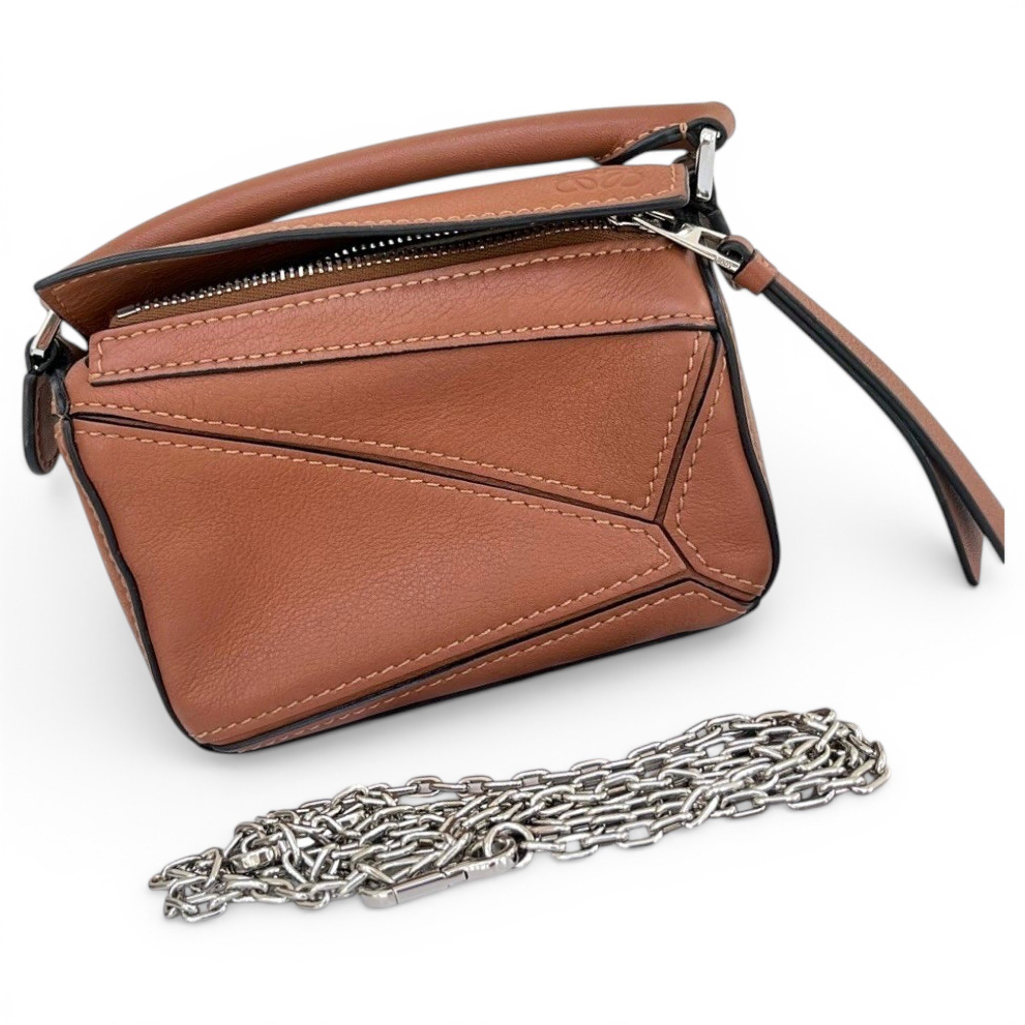 Puzzle leather handbag