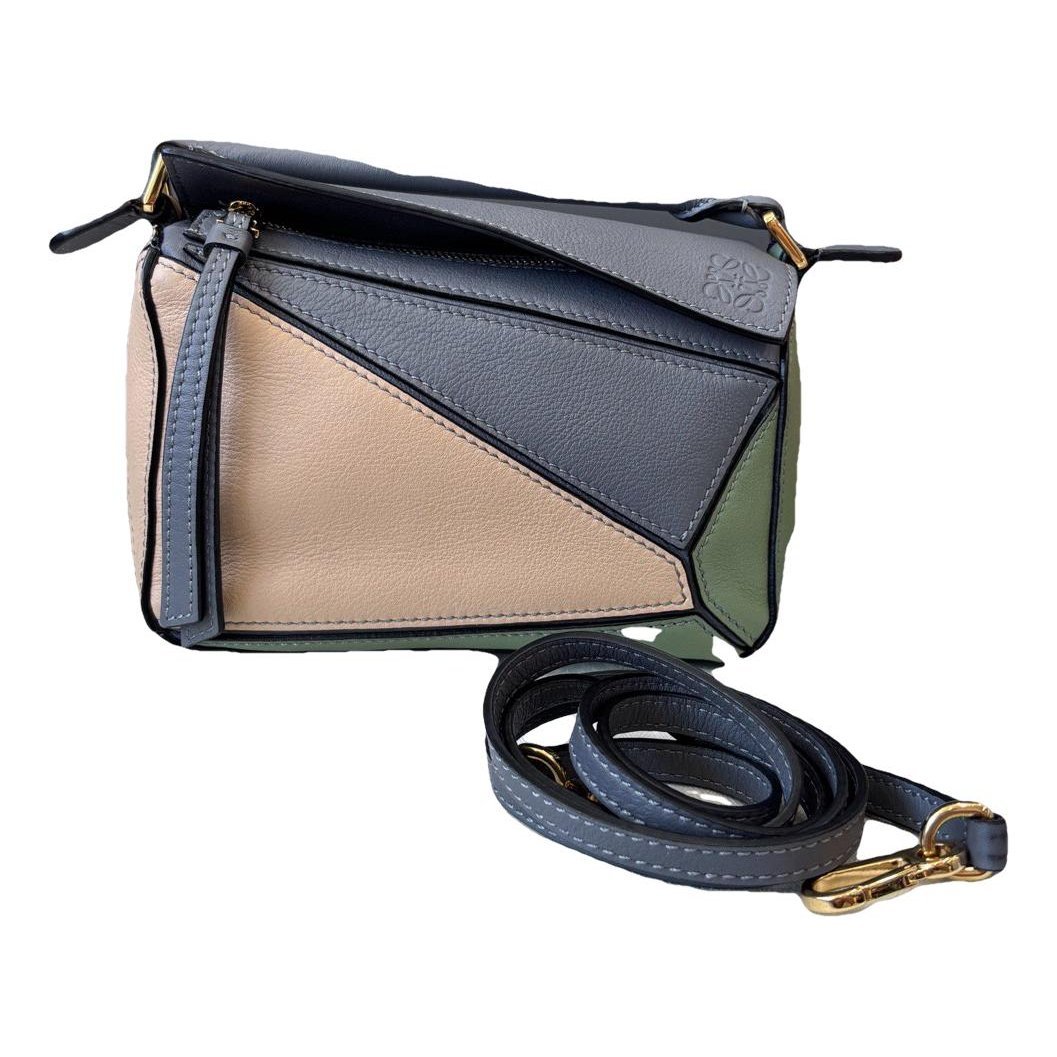 Puzzle leather handbag