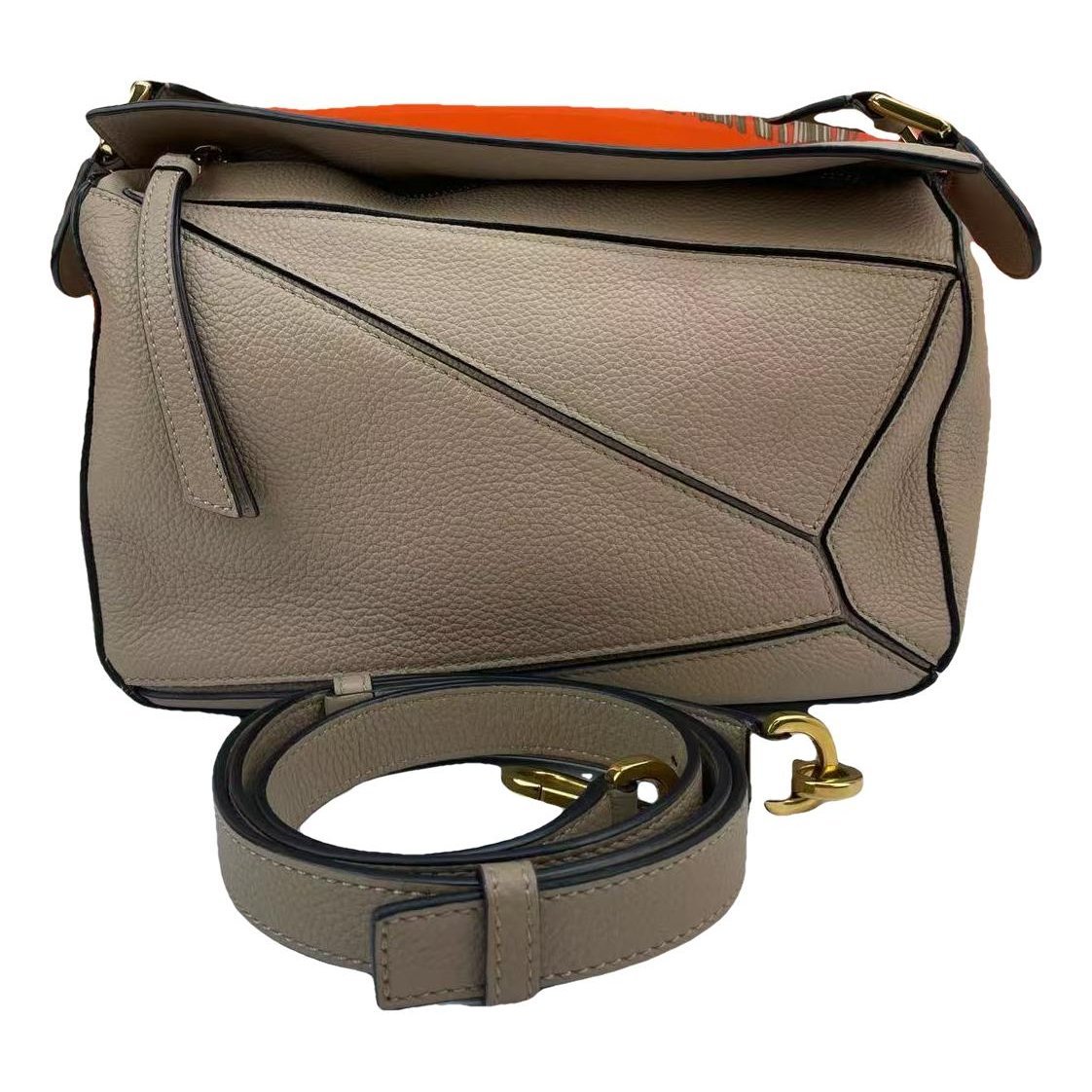 Puzzle leather handbag