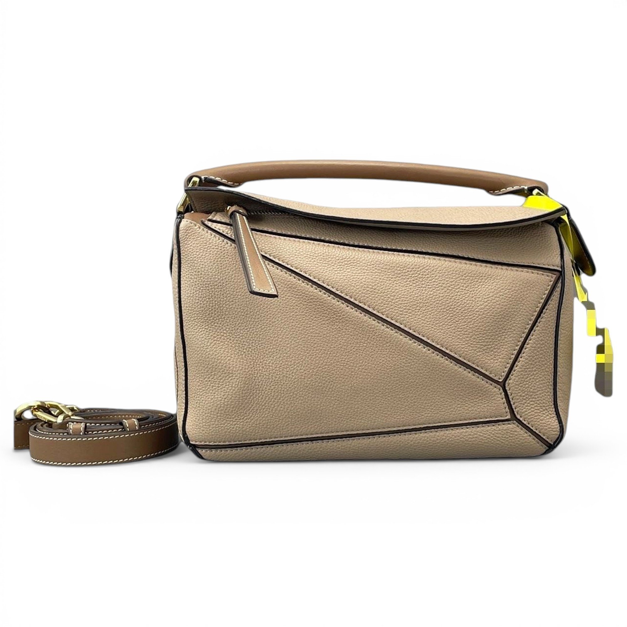 Puzzle leather handbag