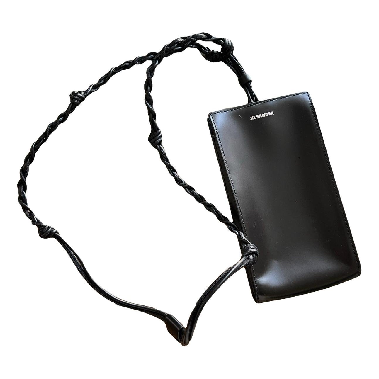 Tangle patent leather crossbody bag