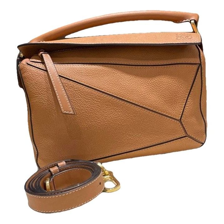 Puzzle leather handbag