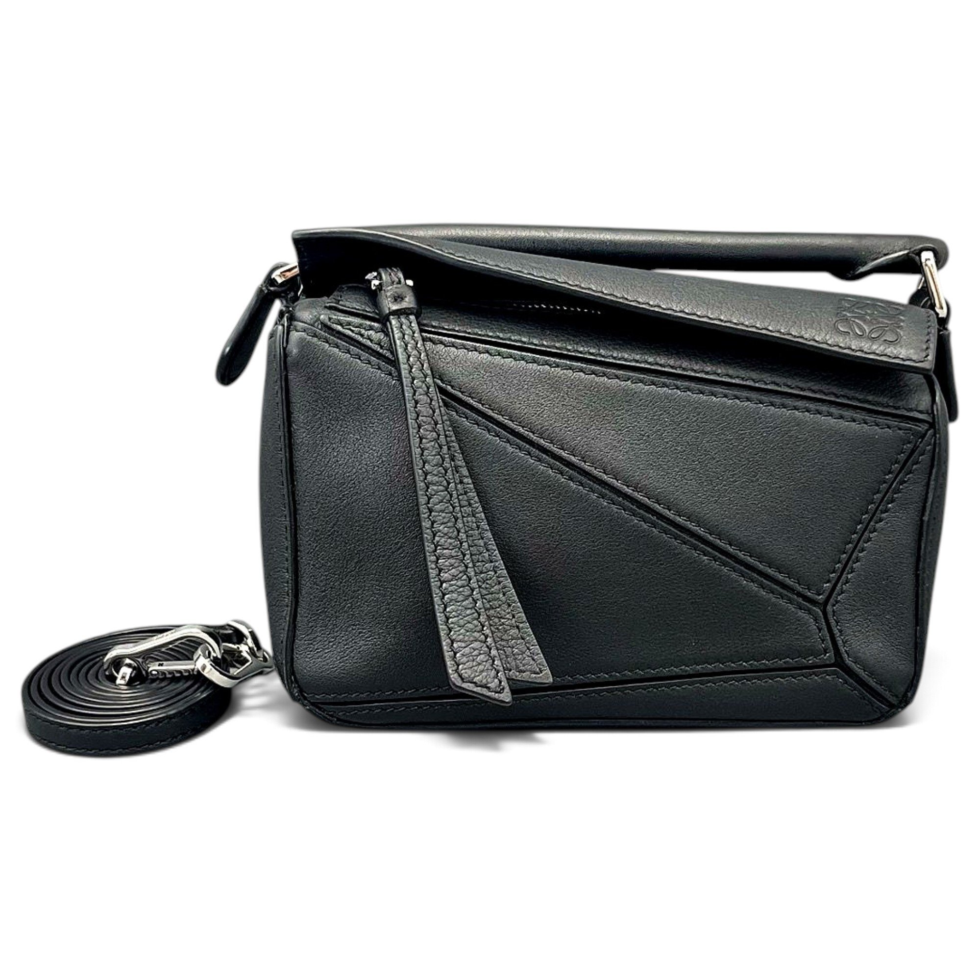 Puzzle leather handbag