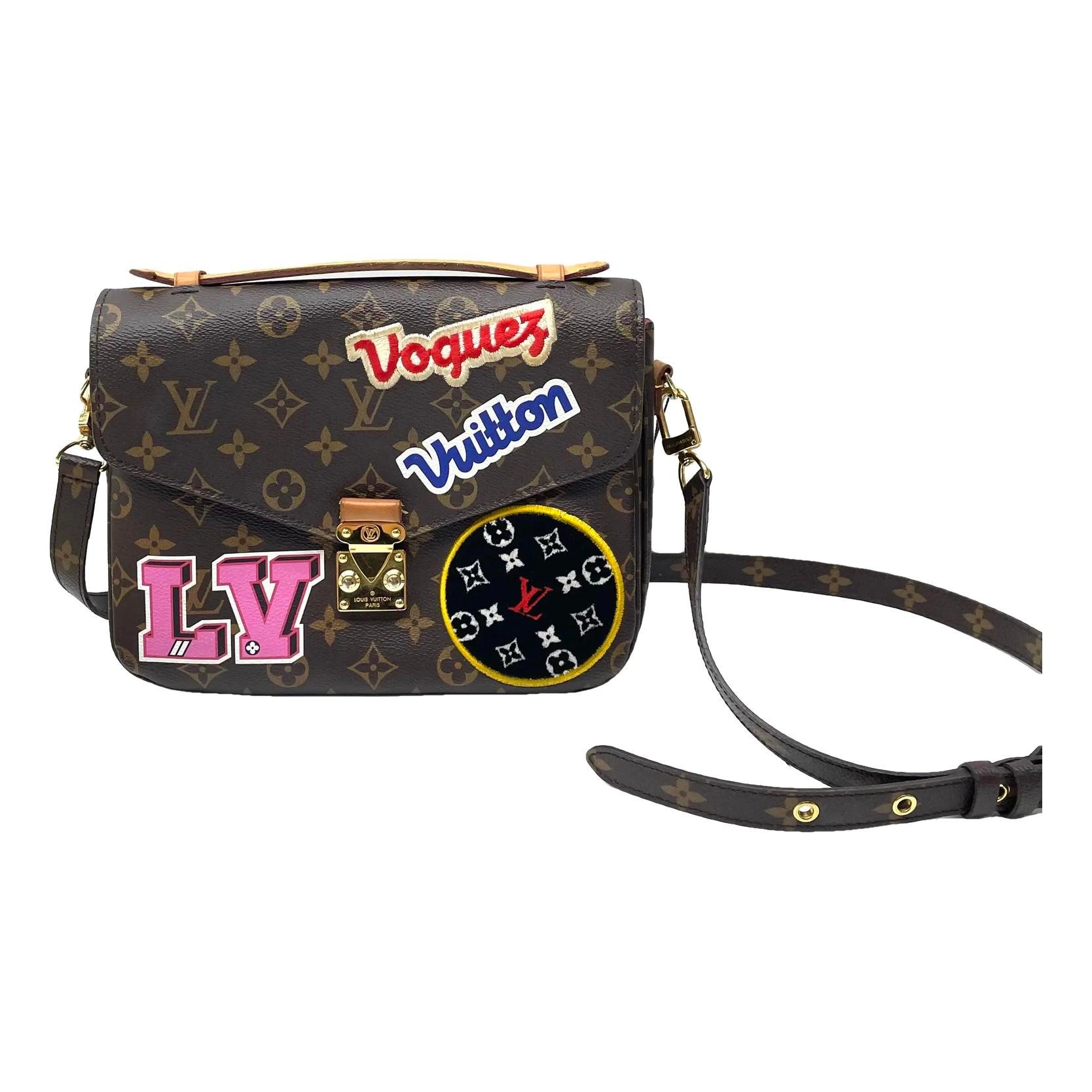 Metis vinyl crossbody bag