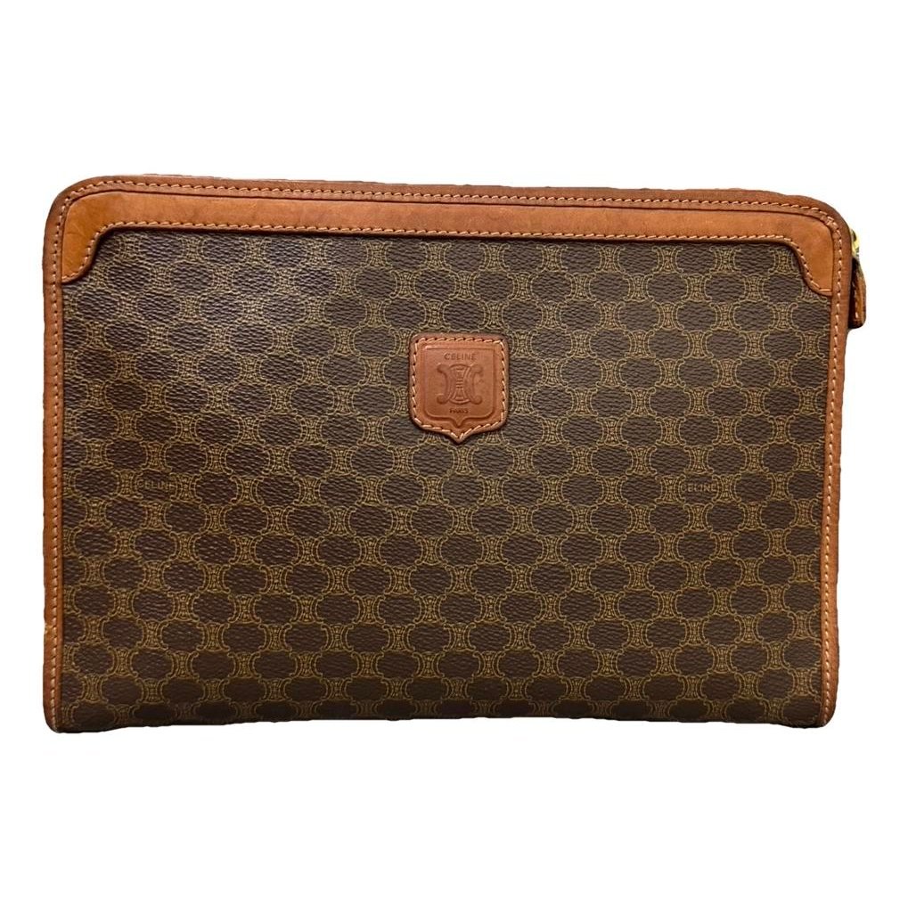 Triomphe Vintage leather clutch bag